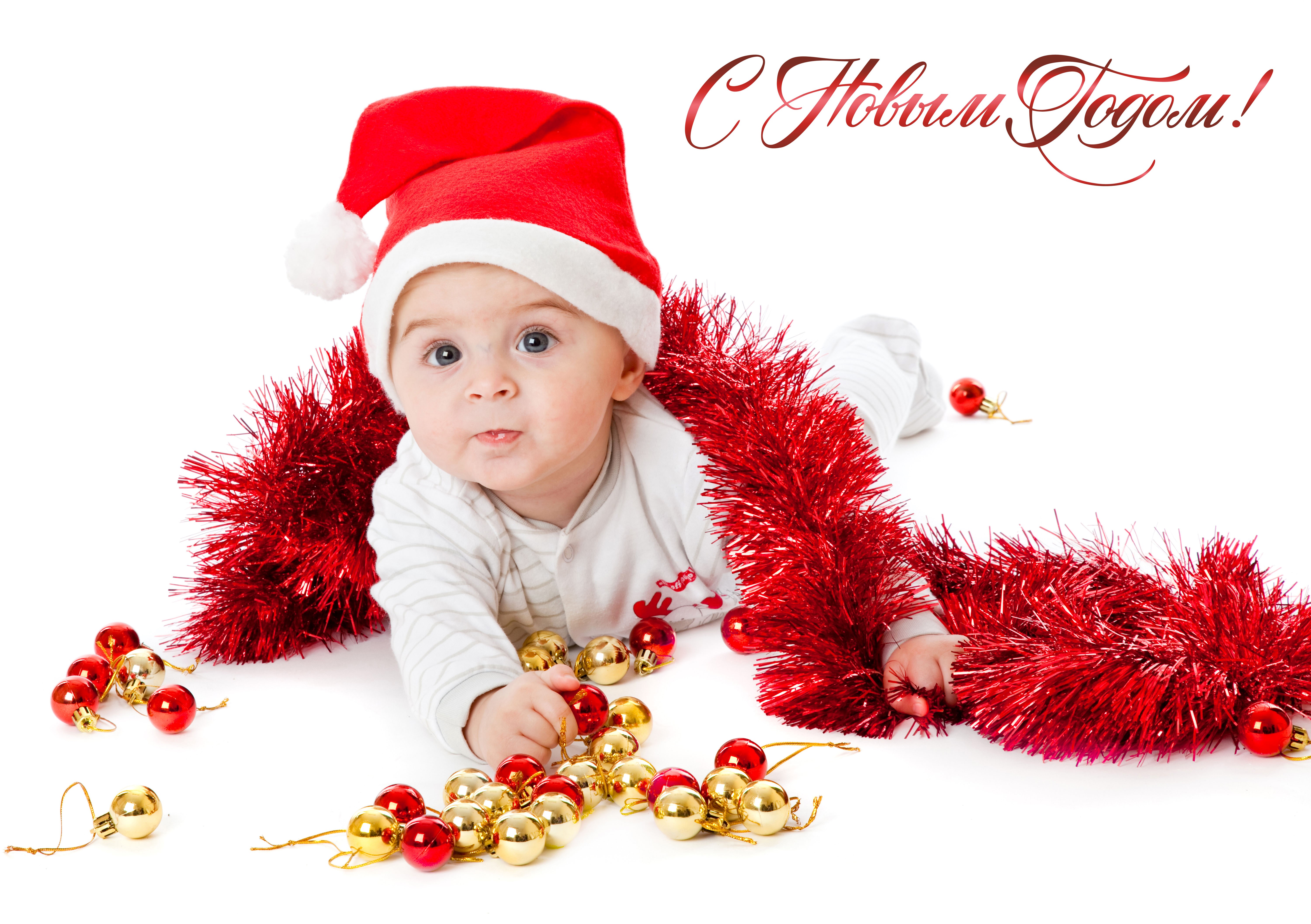 Baby in Santa hat with Christmas ornaments HD Wallpaper