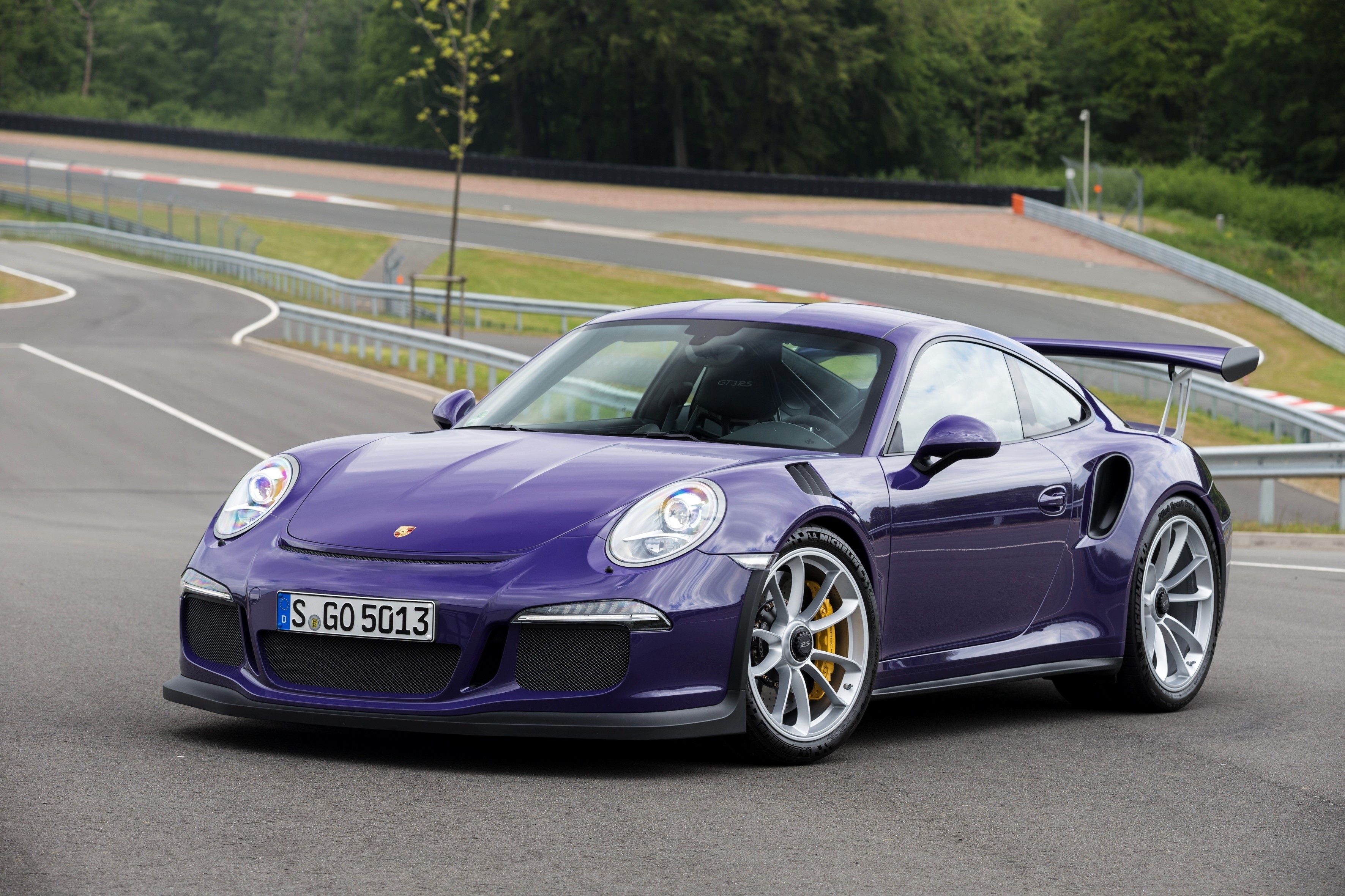Violet Porsche 911 GT3 RS 991 on a race track HD Wallpaper
