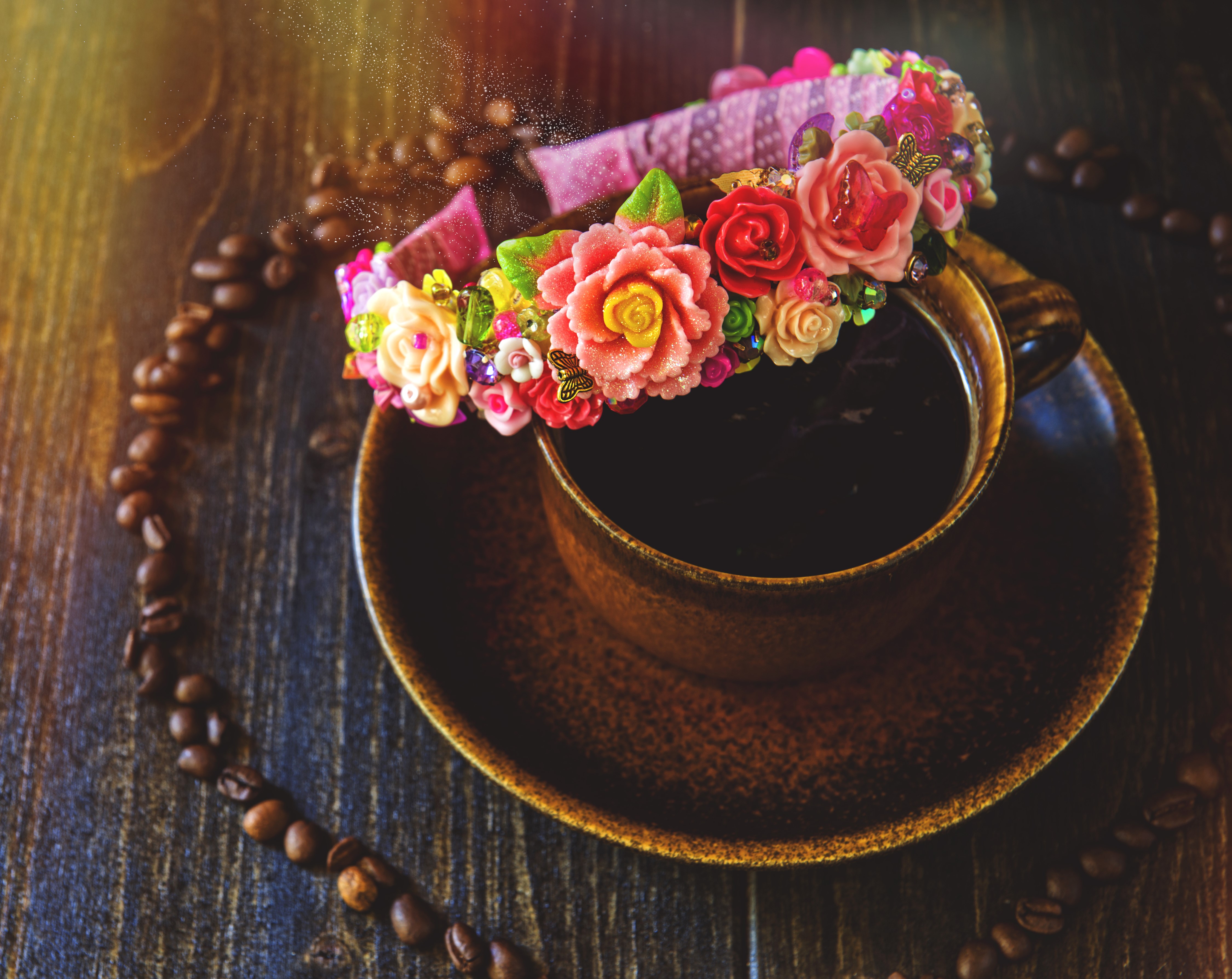 Coffee cup with floral headband and coffee beans HD Wallpaper