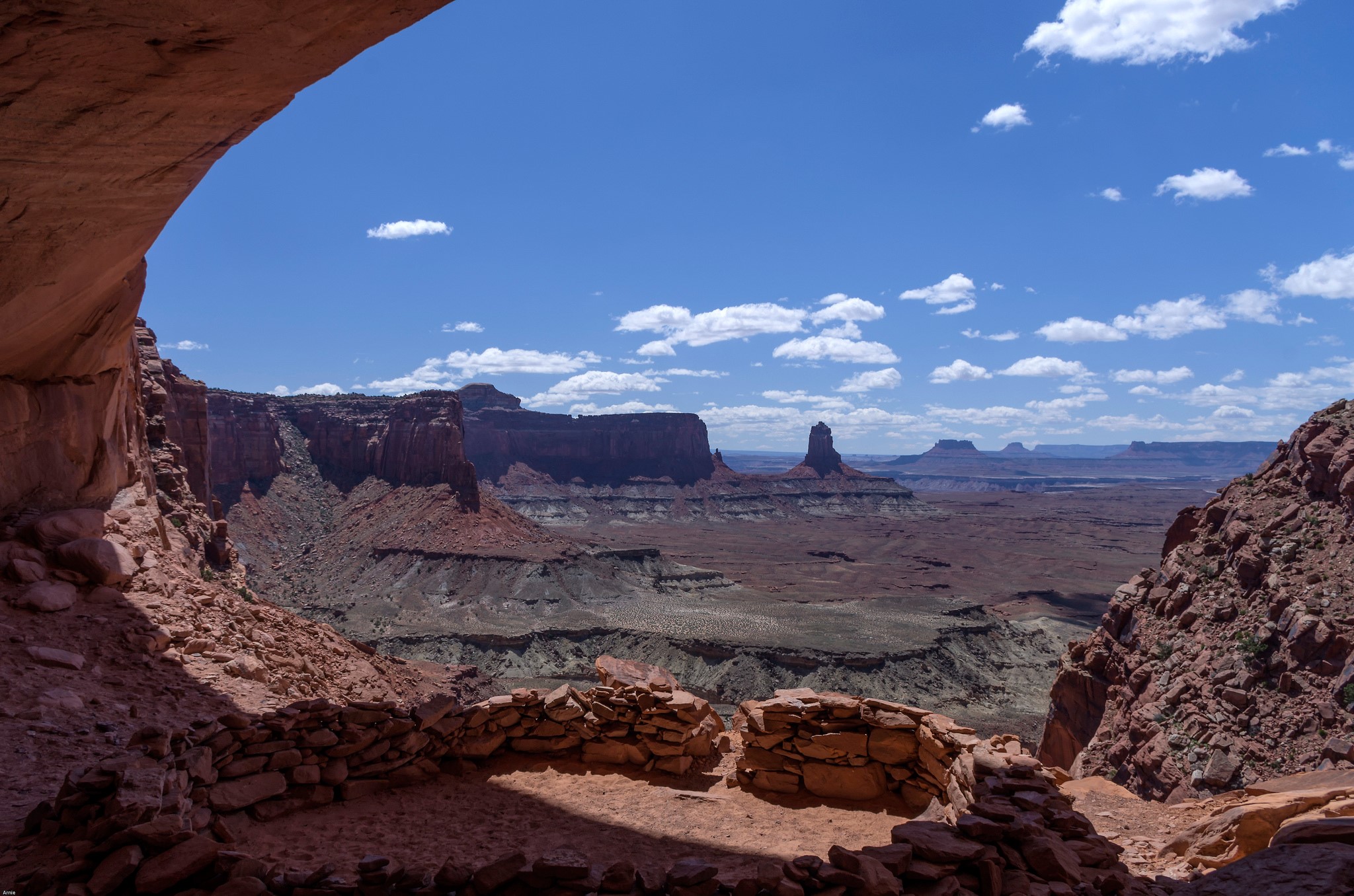 Ancient ruins in a desert canyon landscape HD Wallpaper