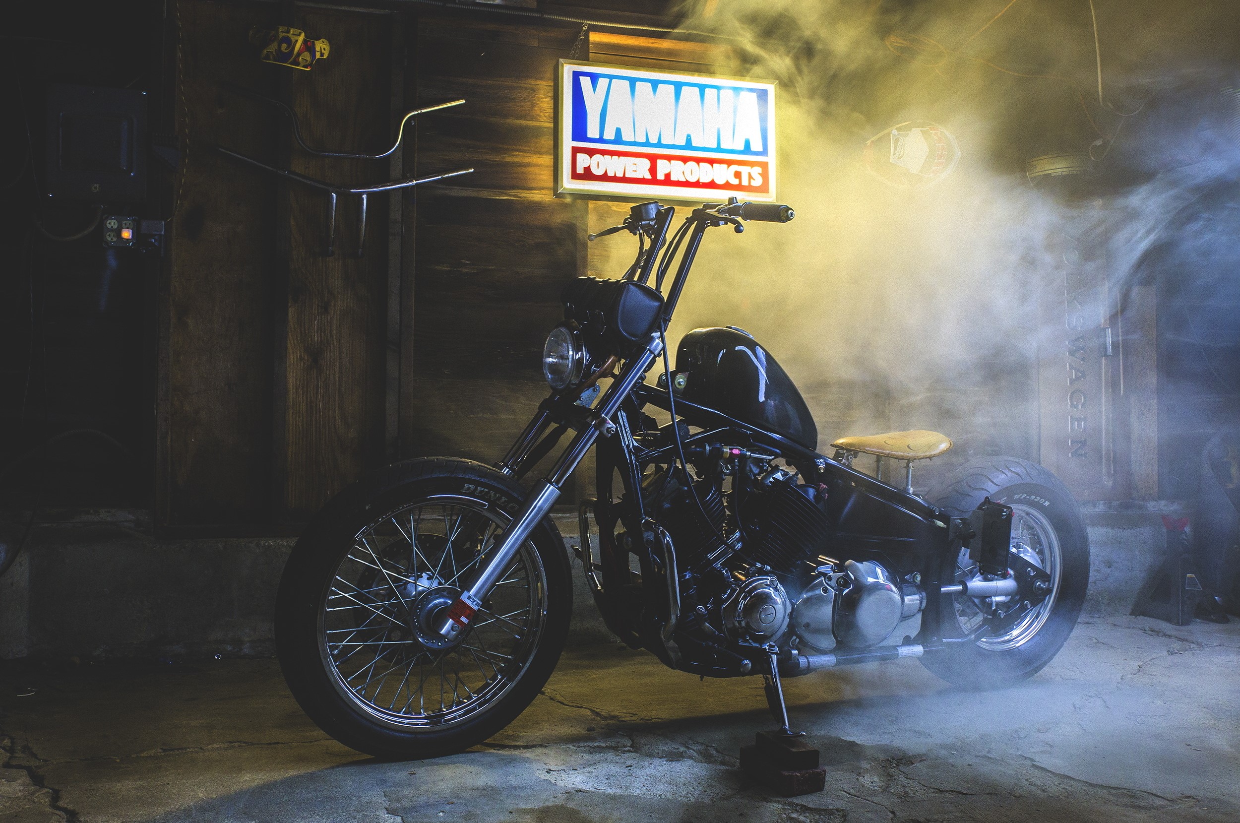 Custom Yamaha V Star motorcycle in garage HD Wallpaper