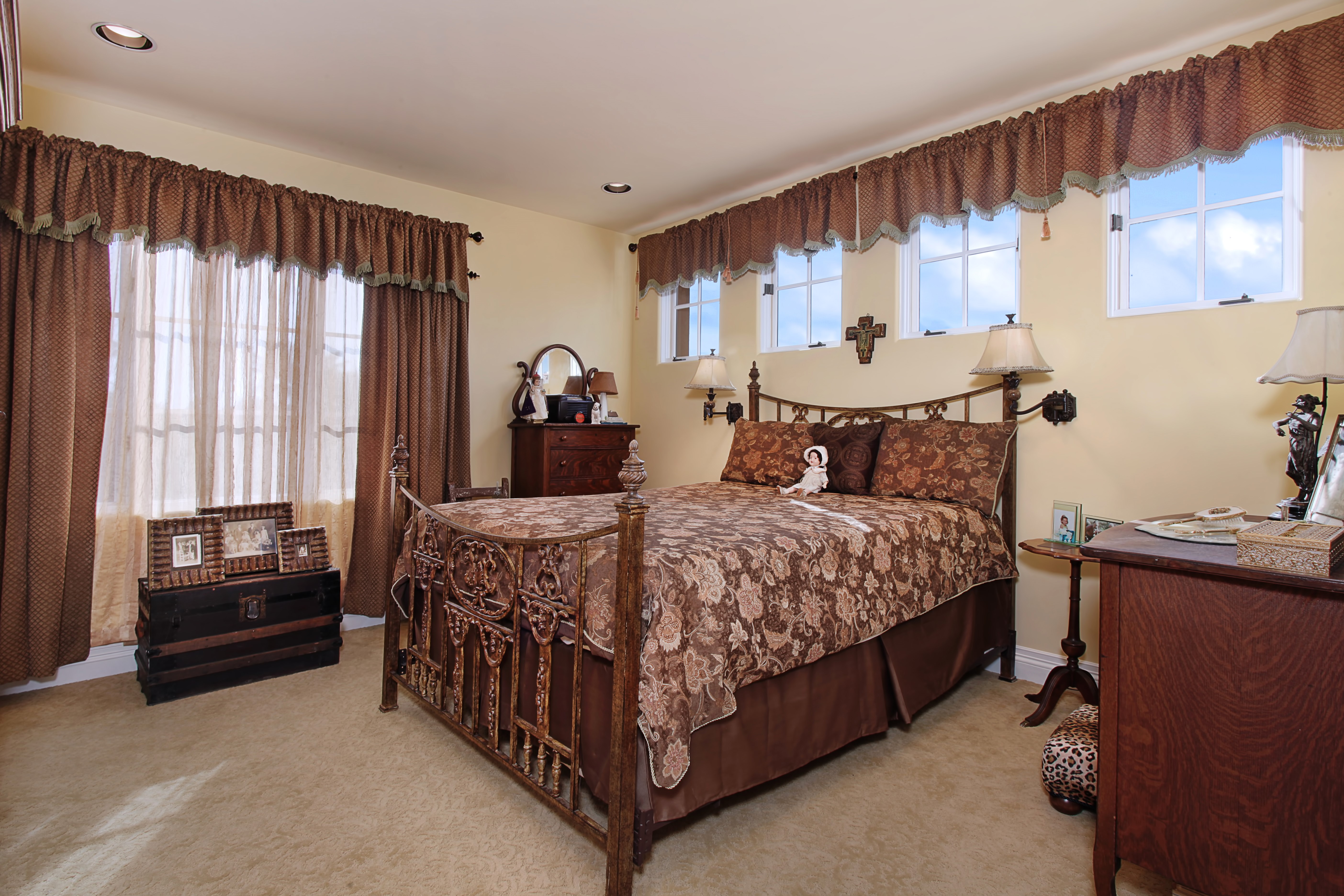 Bedroom with ornate bed and brown curtains HD Wallpaper