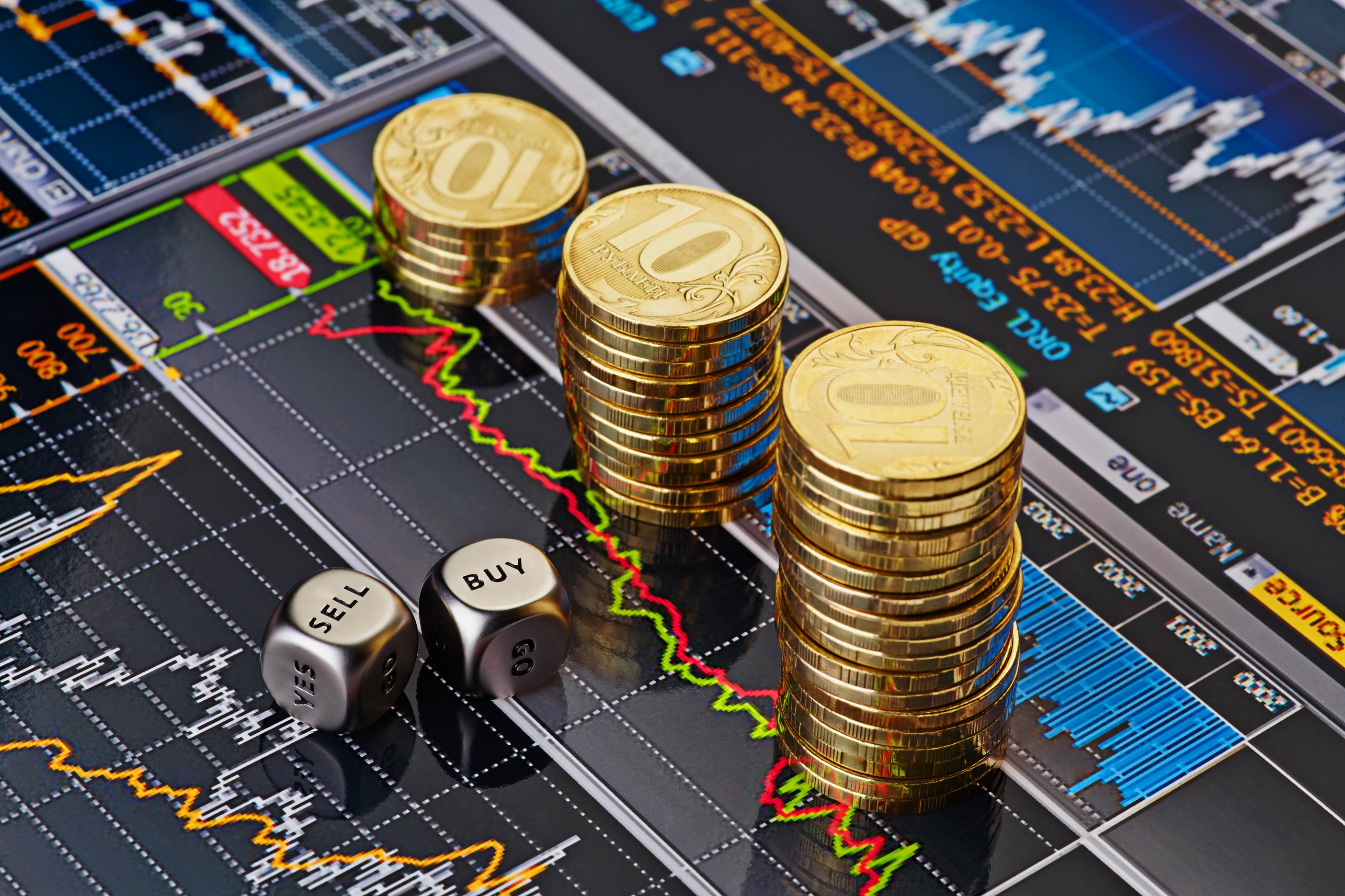 Coins and dice on financial charts HD Wallpaper