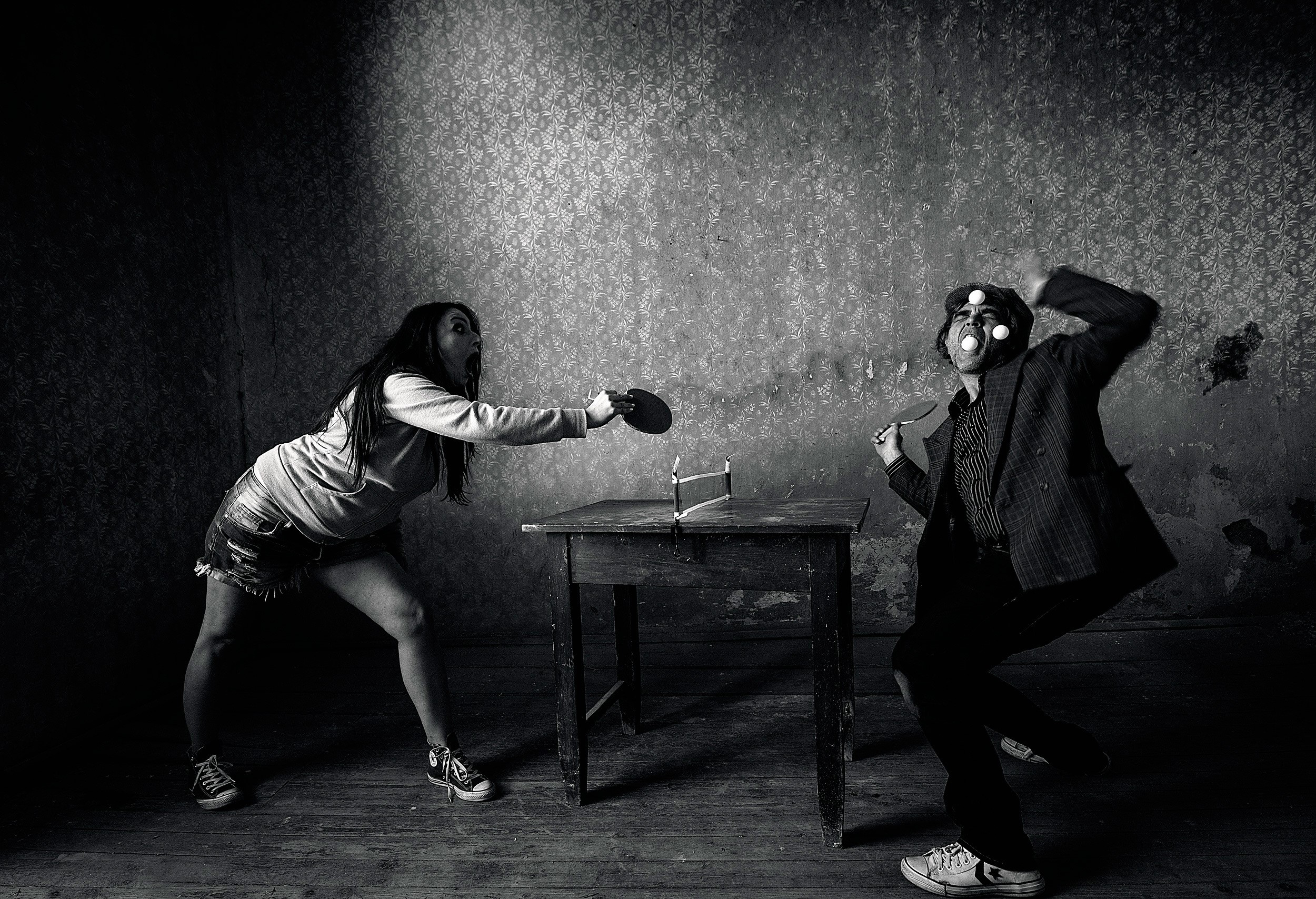 Man and woman playing table tennis HD Wallpaper