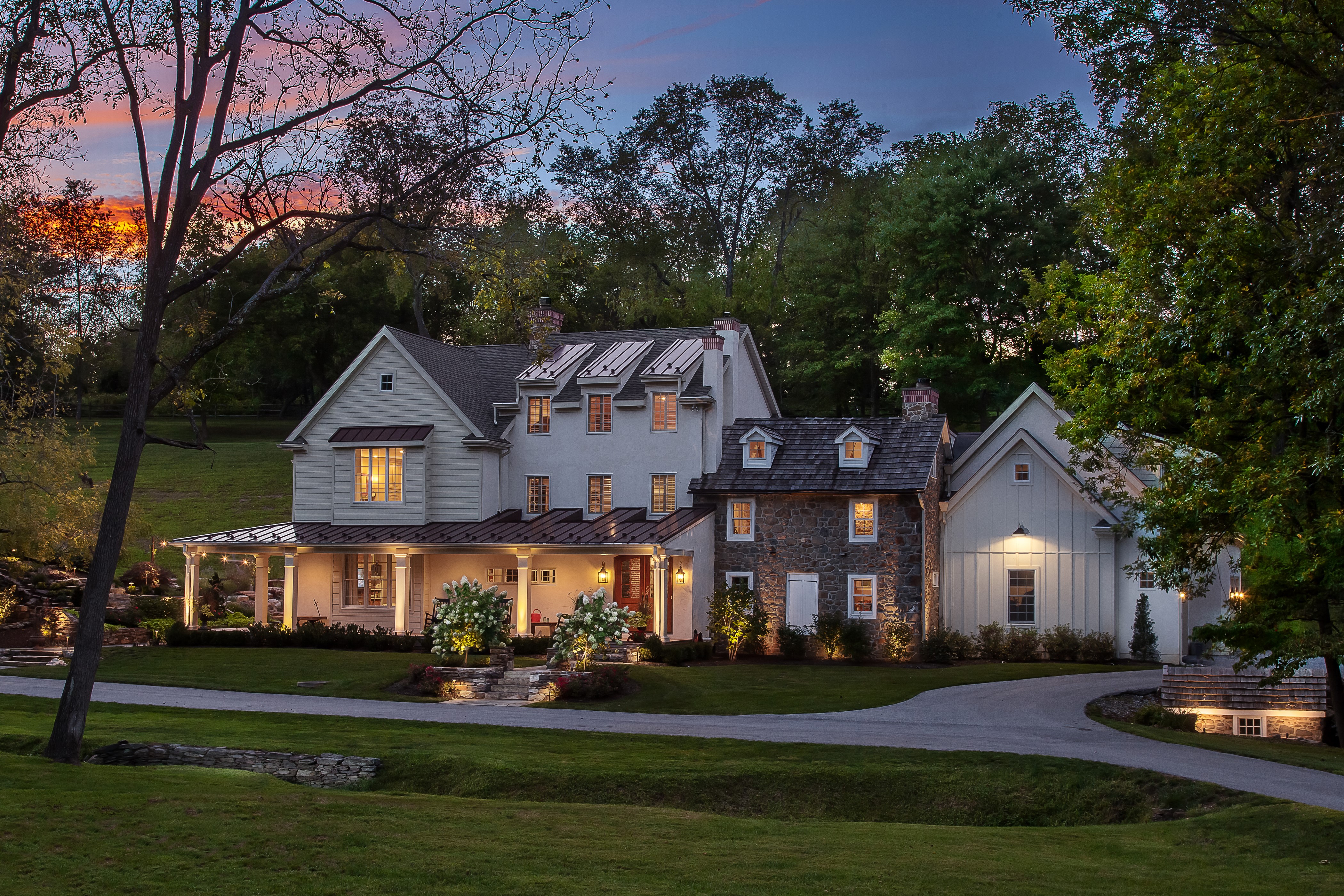 Luxury House with Stone and White Siding HD Wallpaper
