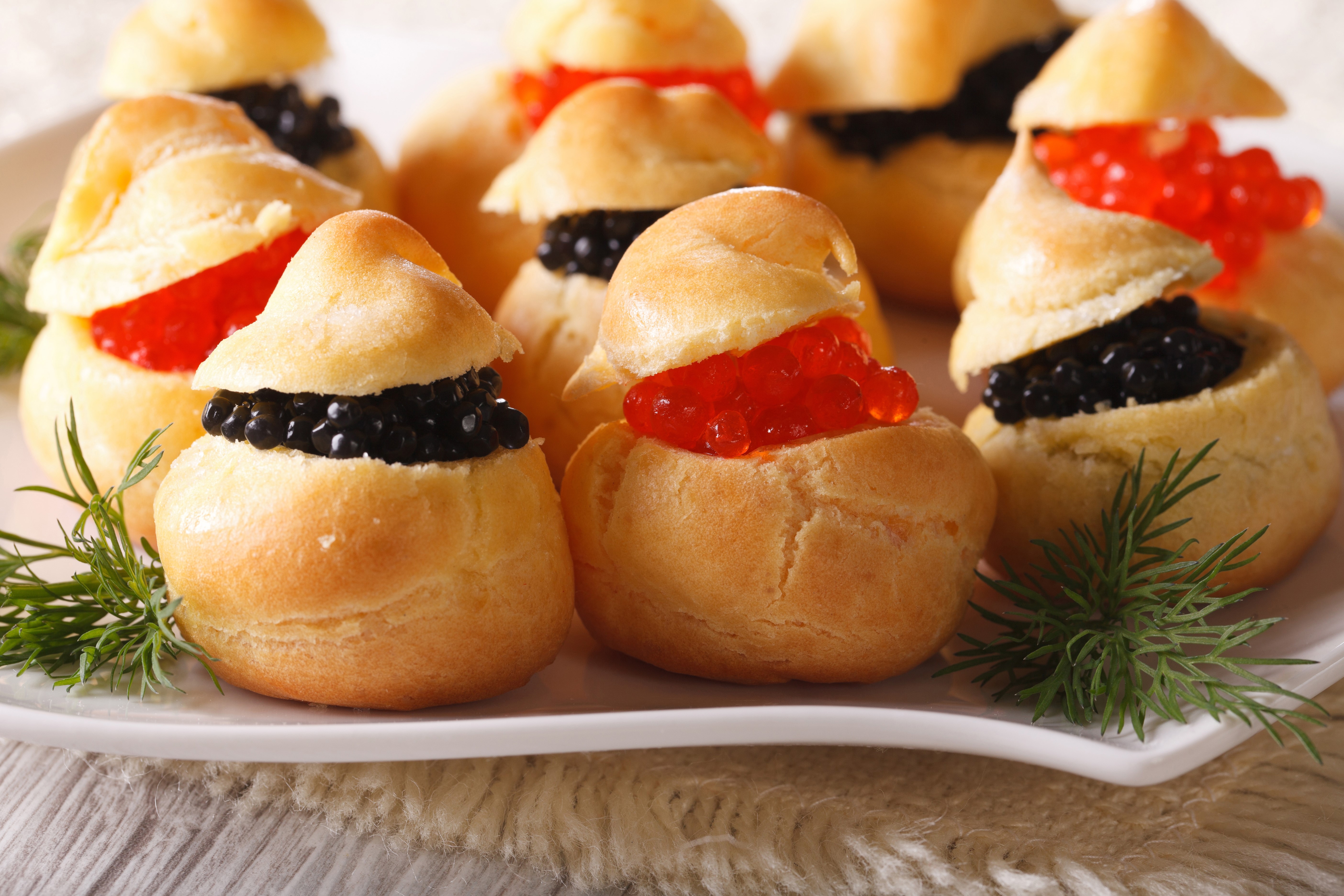 Cream puffs with black and red caviar HD Wallpaper
