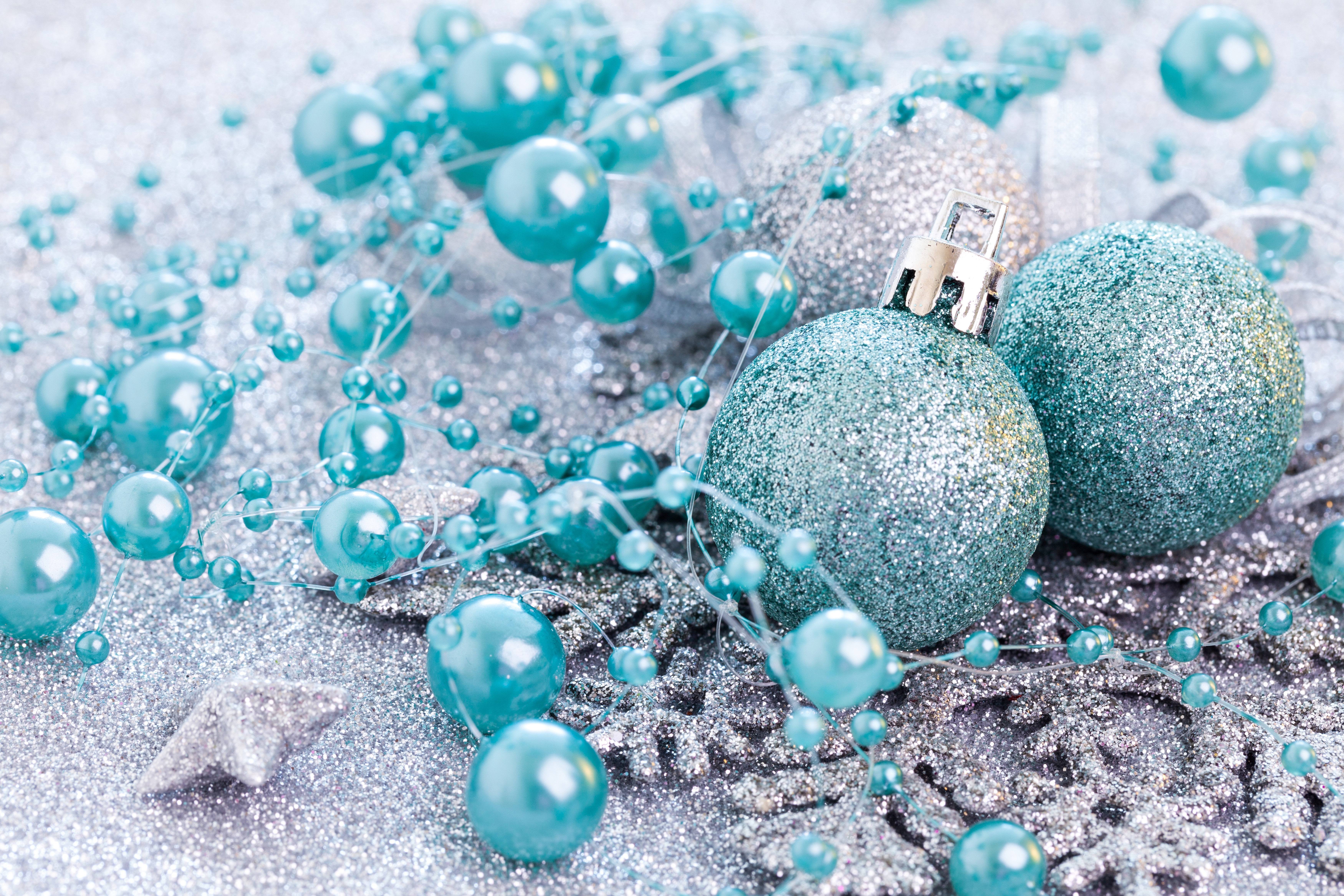 Turquoise Christmas ornaments and beads on glitter HD Wallpaper