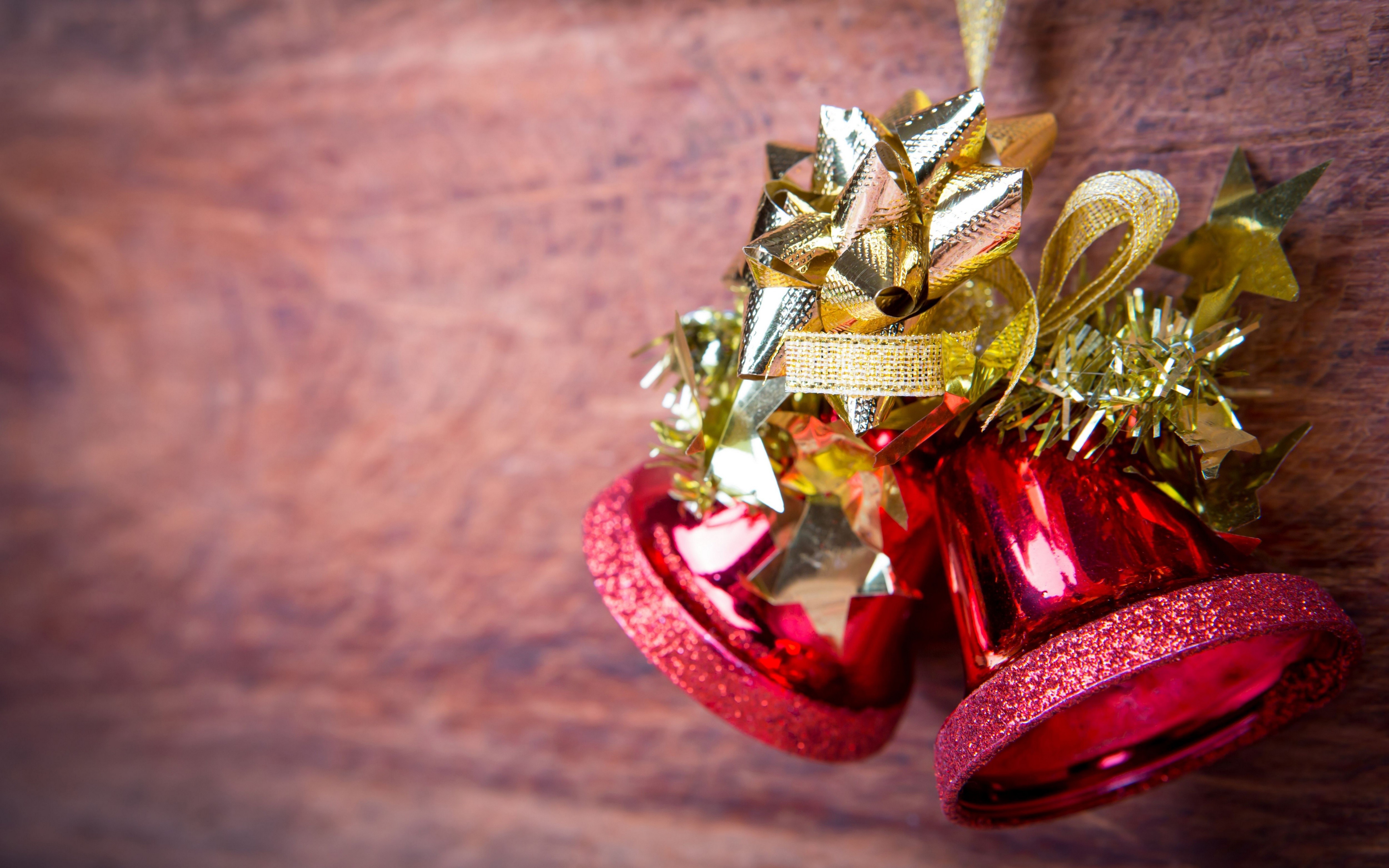 Christmas Bells with Gold Bow and Stars HD Wallpaper