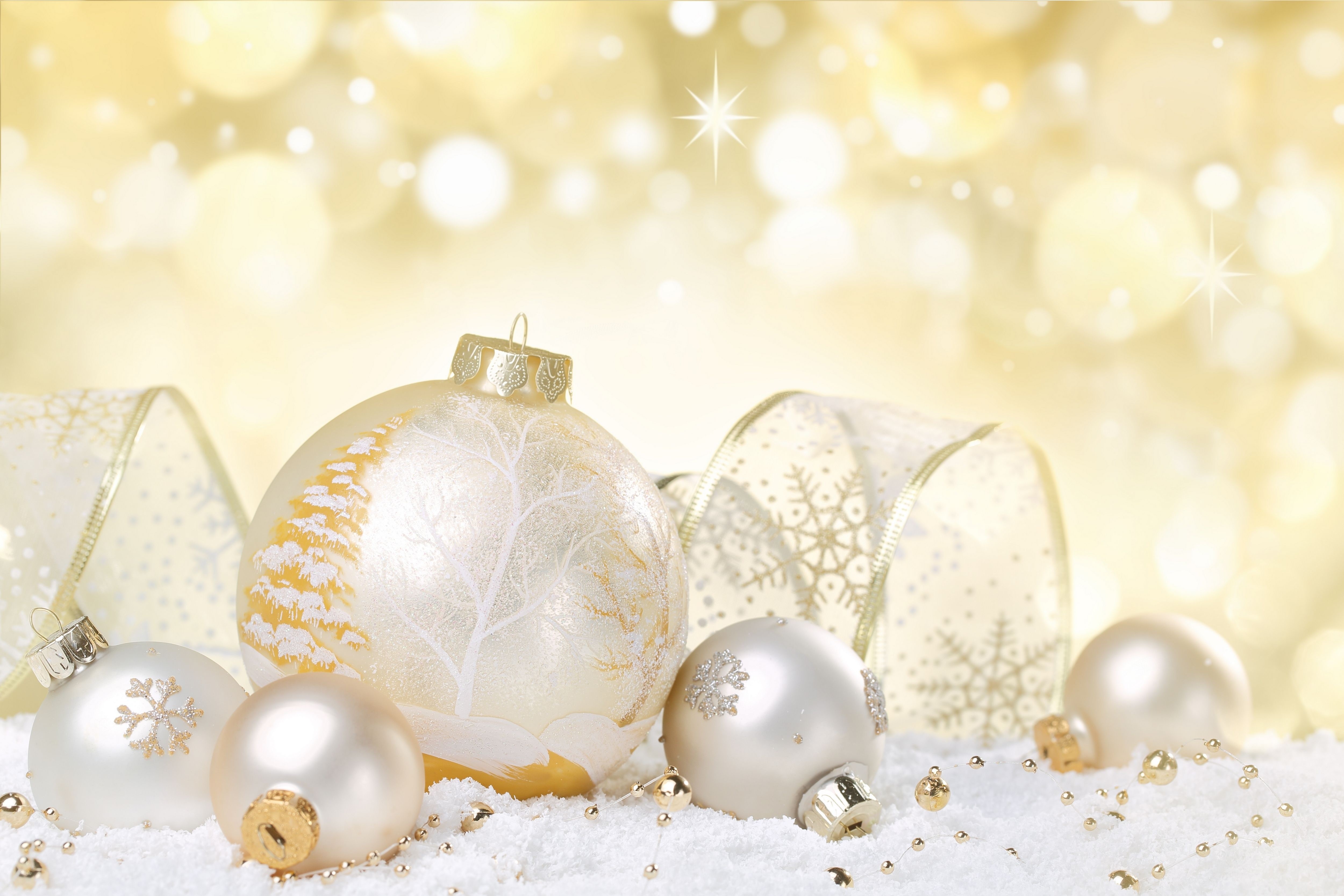 Christmas ornaments and ribbon on snow HD Wallpaper
