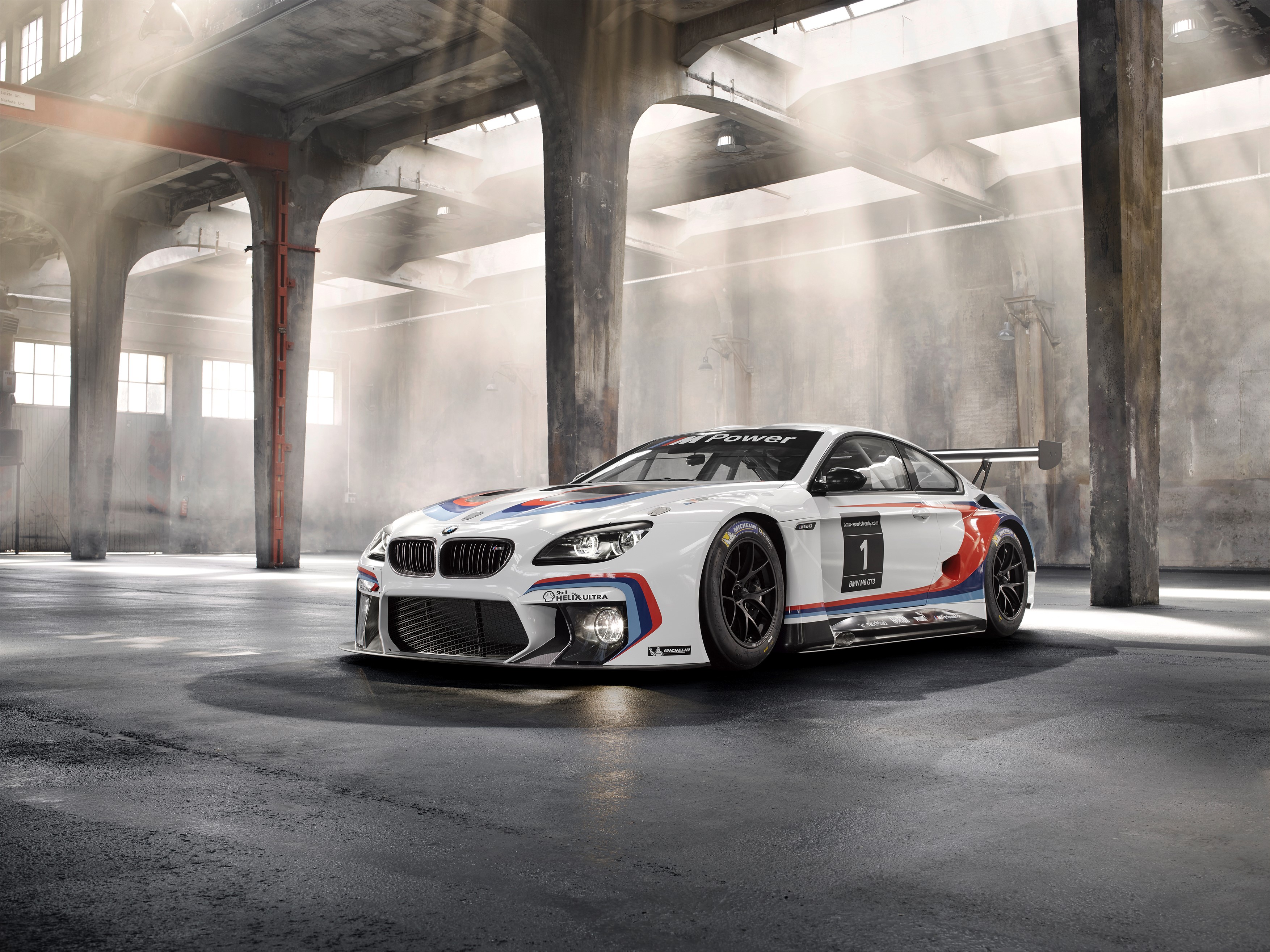 2015 BMW M6 GT3 race car in warehouse HD Wallpaper