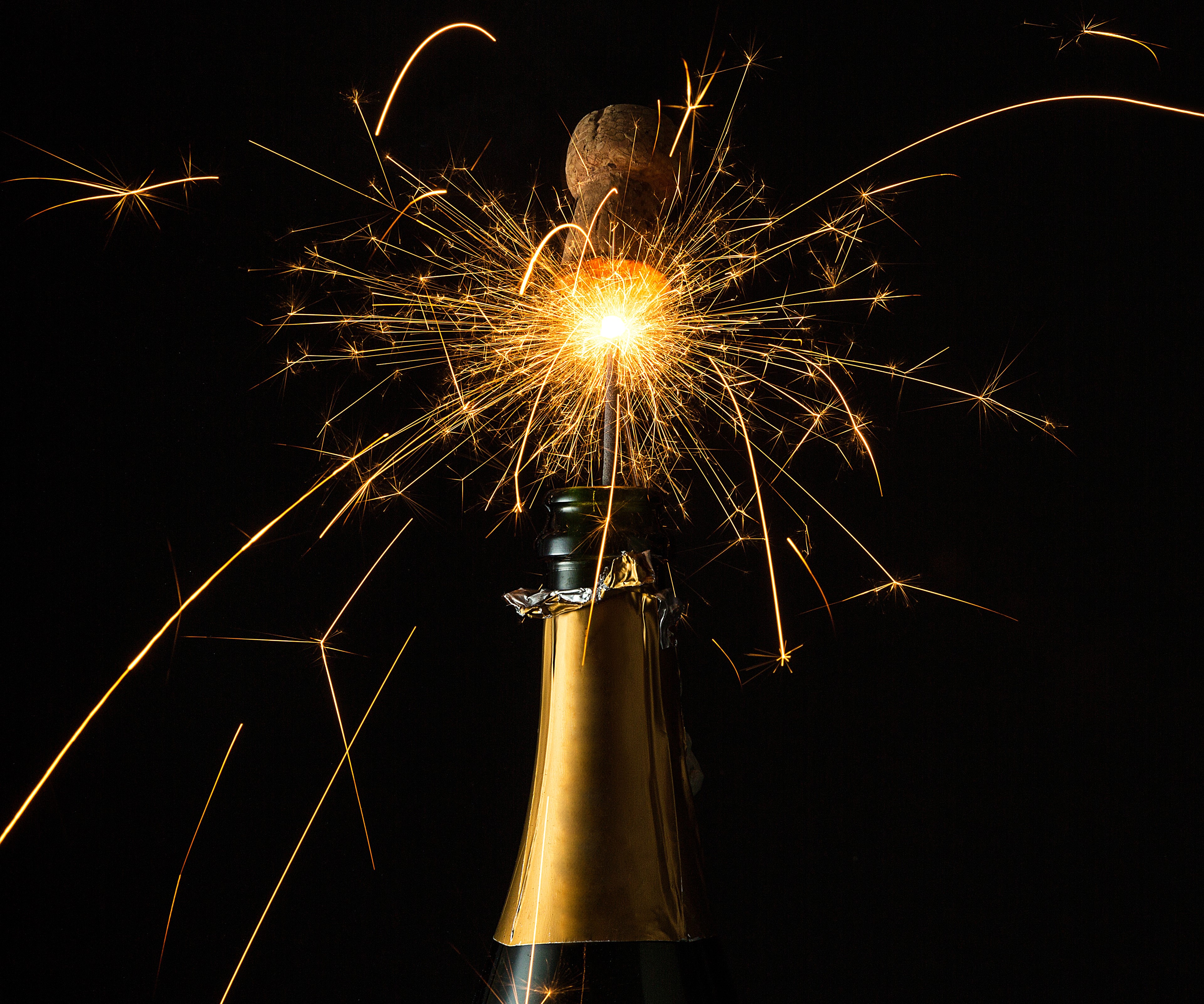 Champagne bottle with sparklers and cork HD Wallpaper