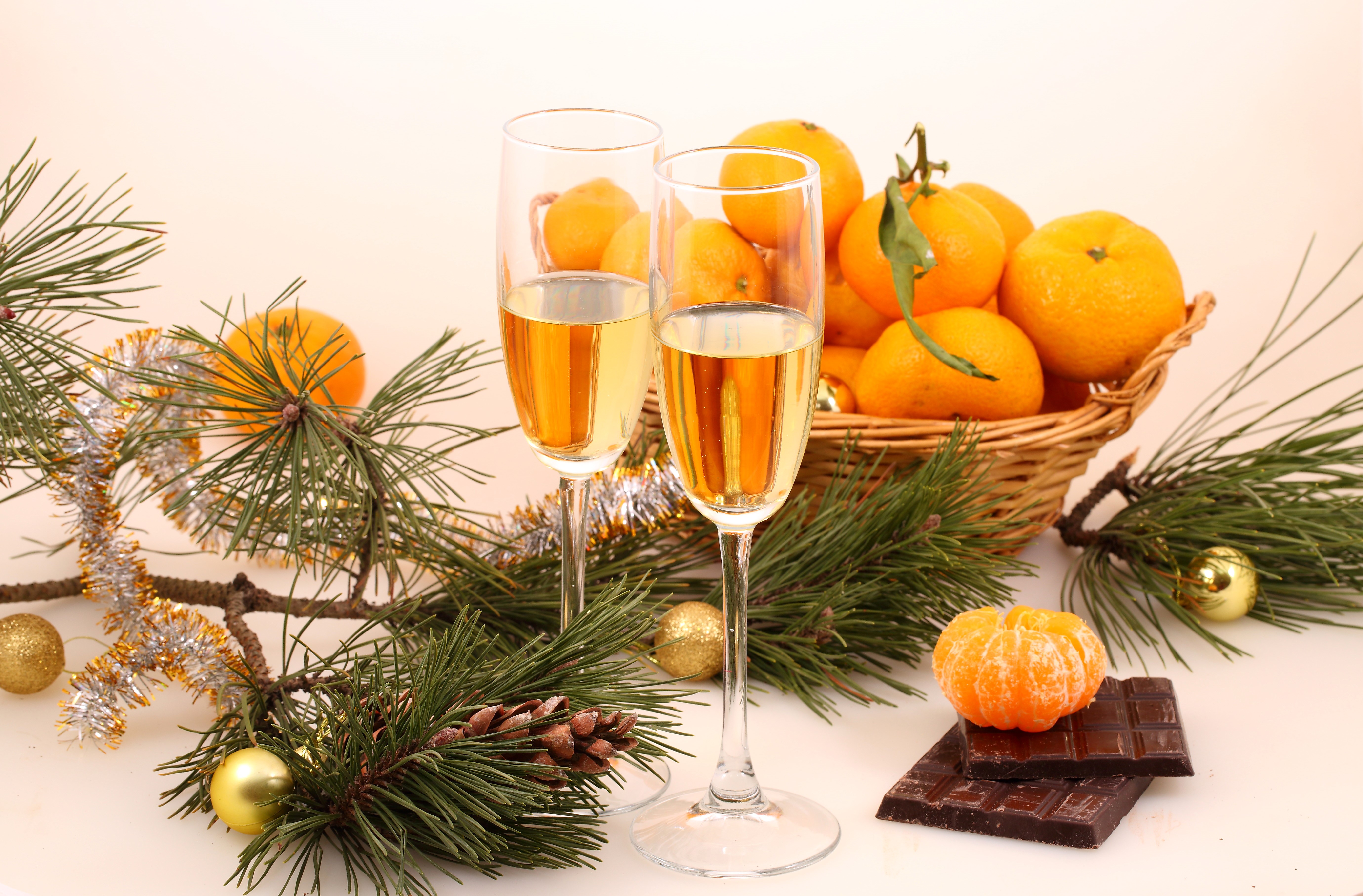 Champagne, Mandarins, Chocolate, and Pine Branches HD Wallpaper