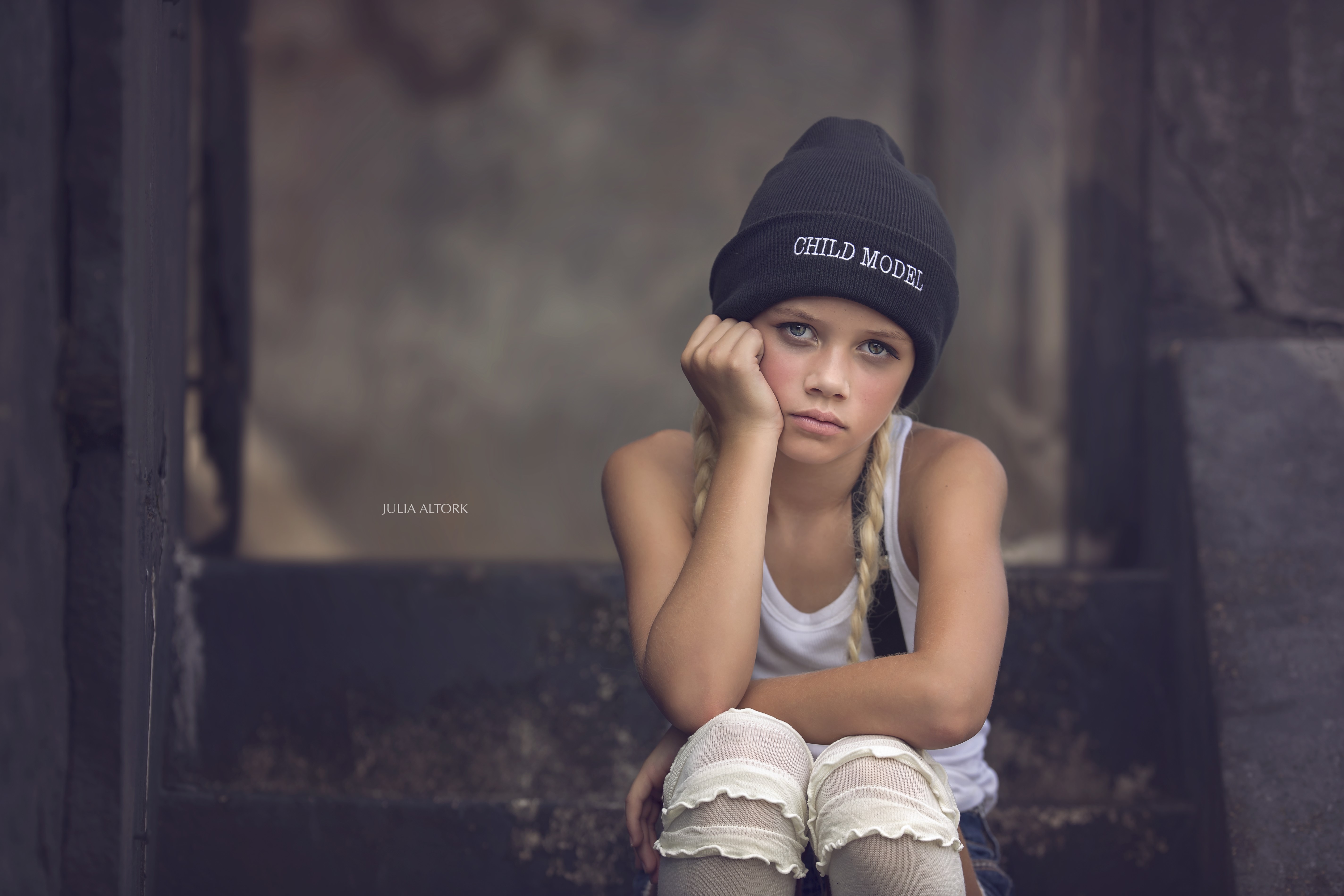 Girl in Winter Hat Sitting on Steps HD Wallpaper