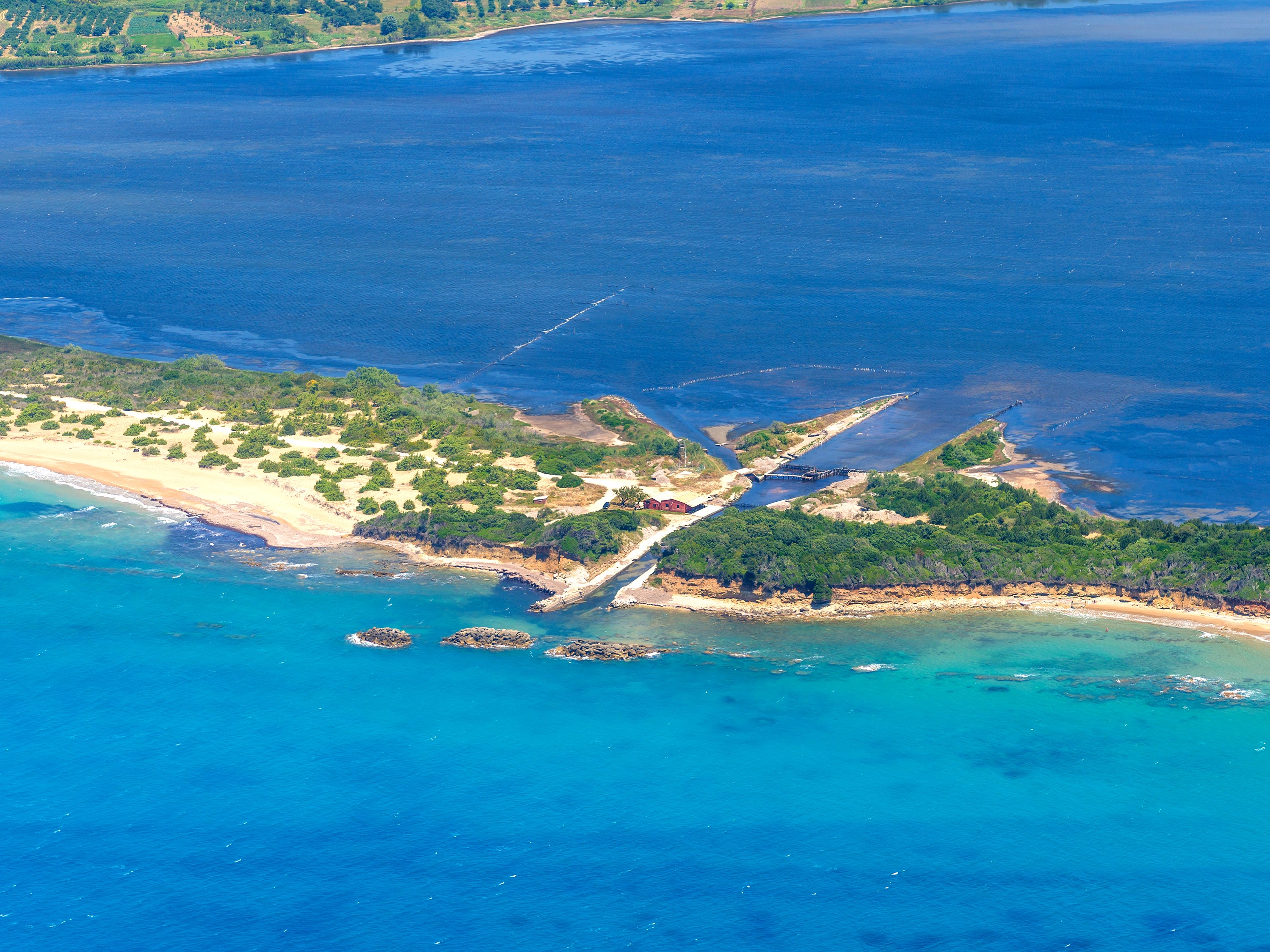 Aerial view of a coastal island in Greece HD Wallpaper