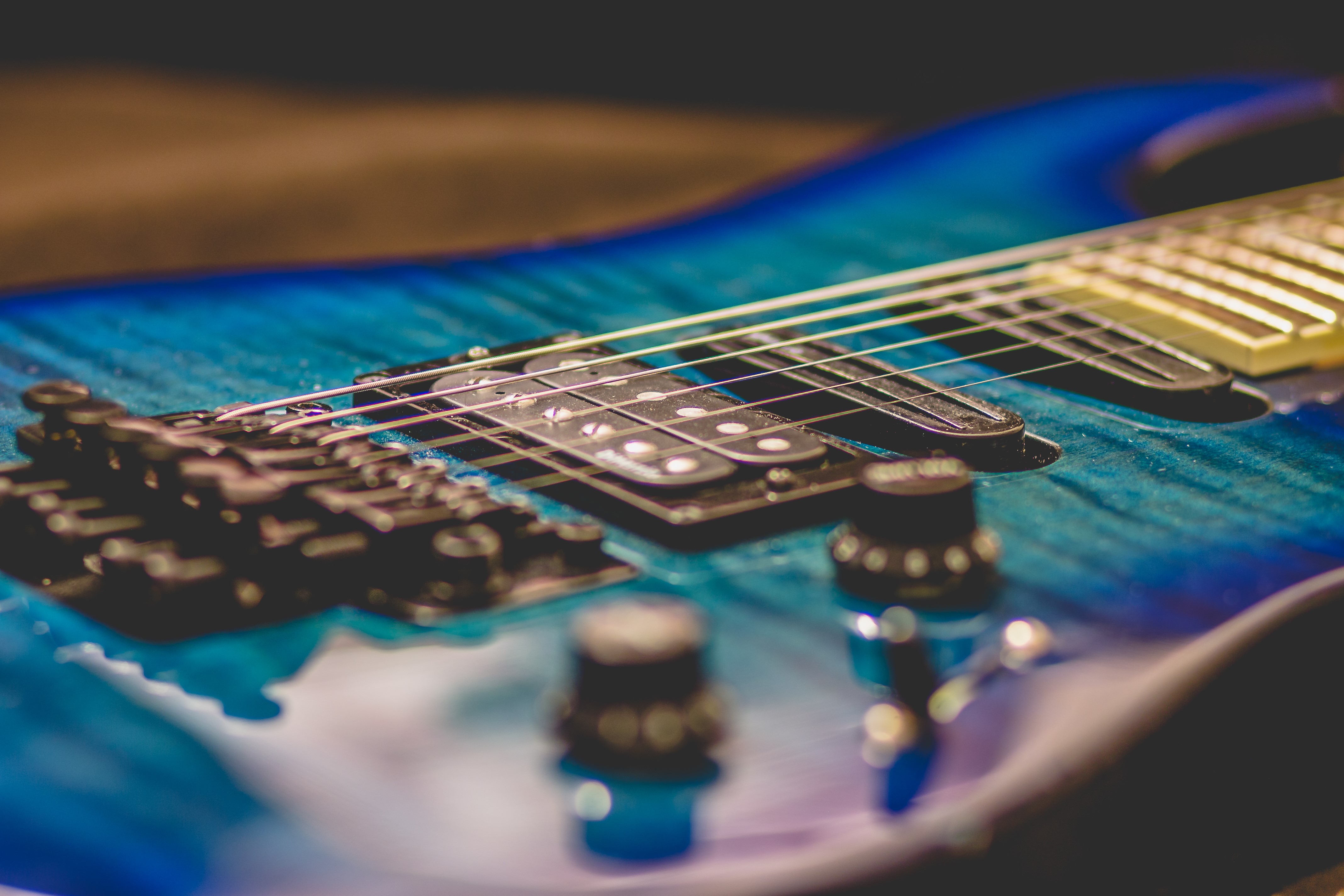 Closeup of a blue electric guitar HD Wallpaper