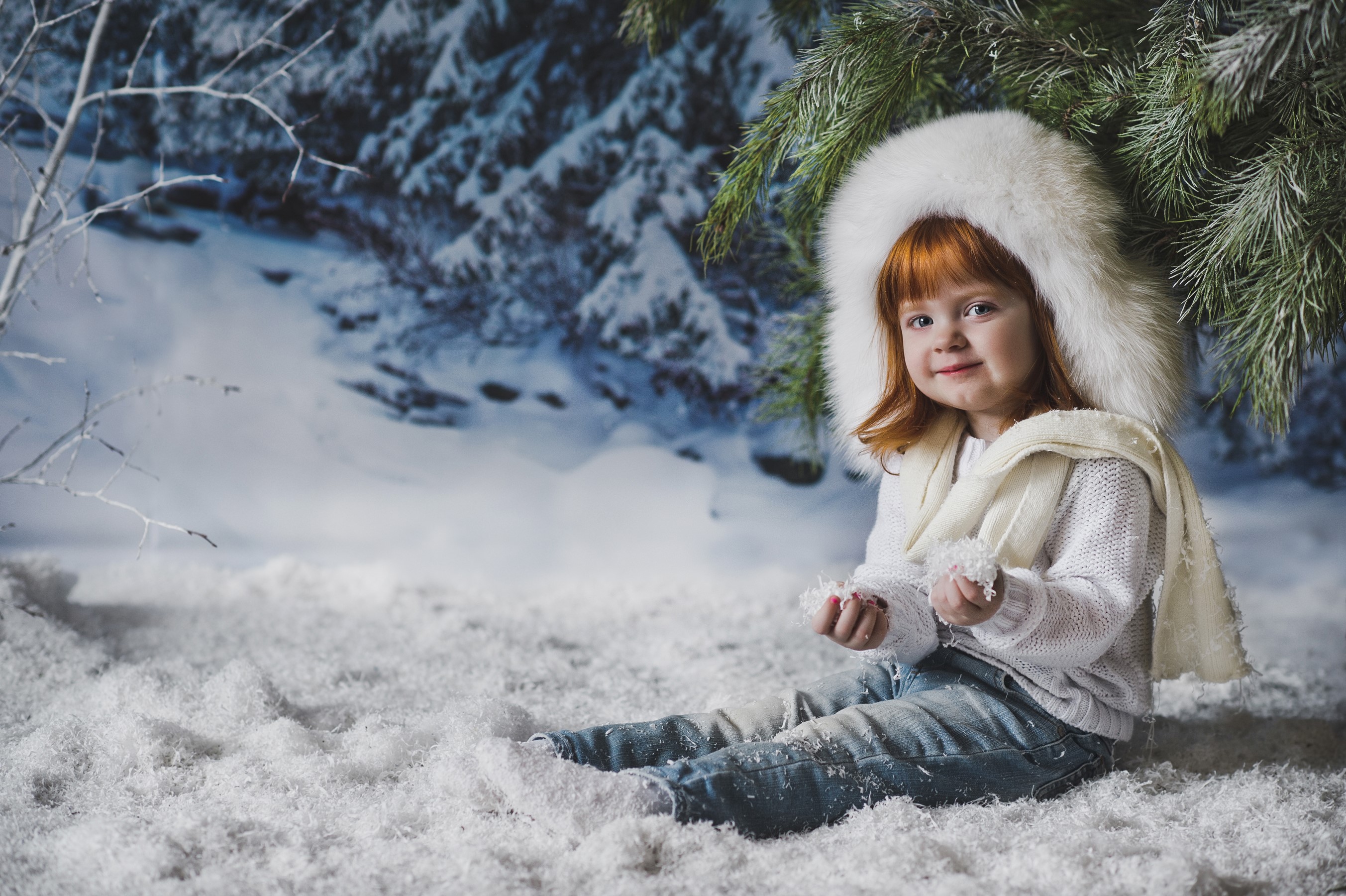 Little redhead girl in a snowy forest HD Wallpaper