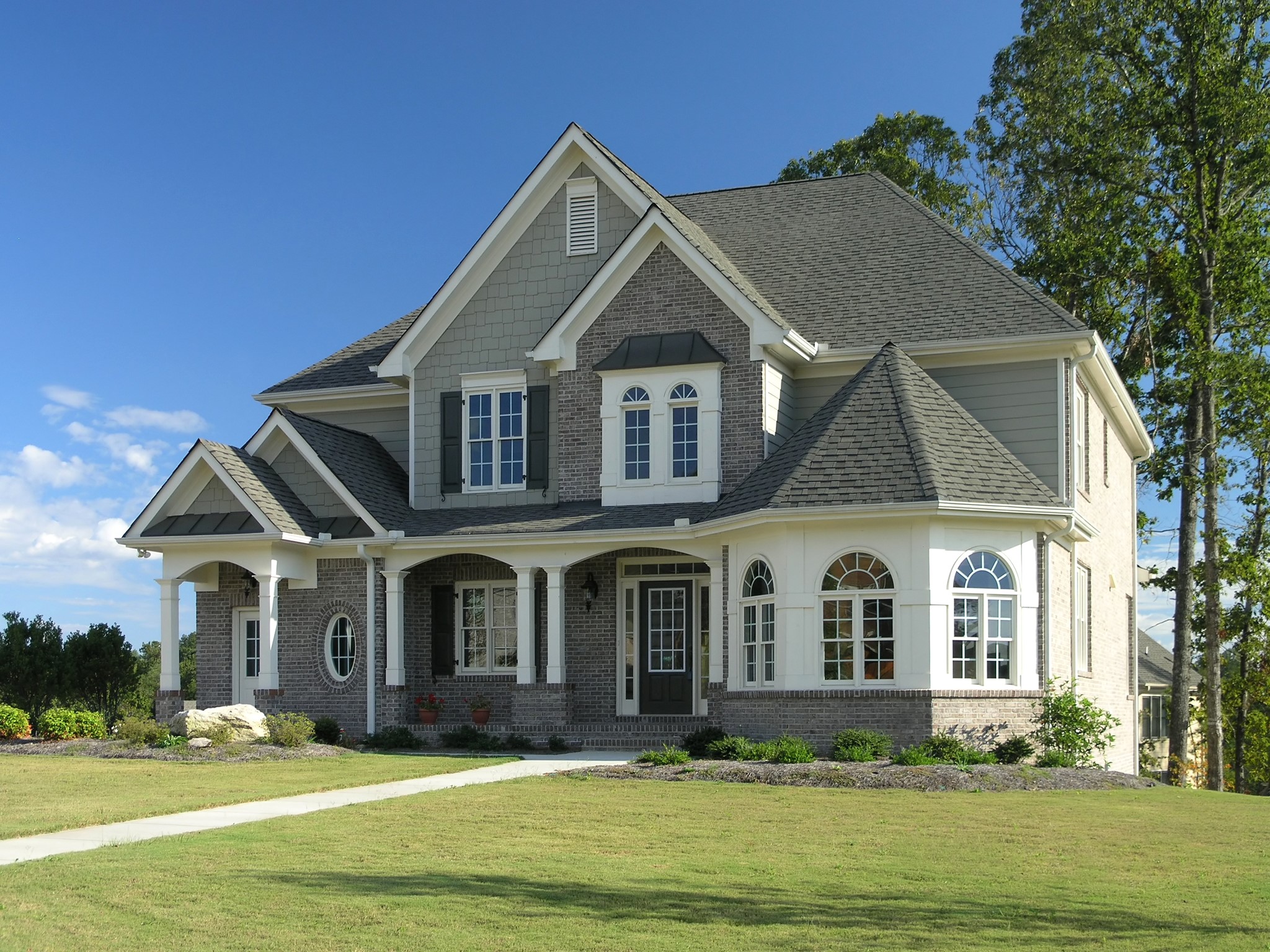 Luxury Brick and Siding House with Lawn HD Wallpaper