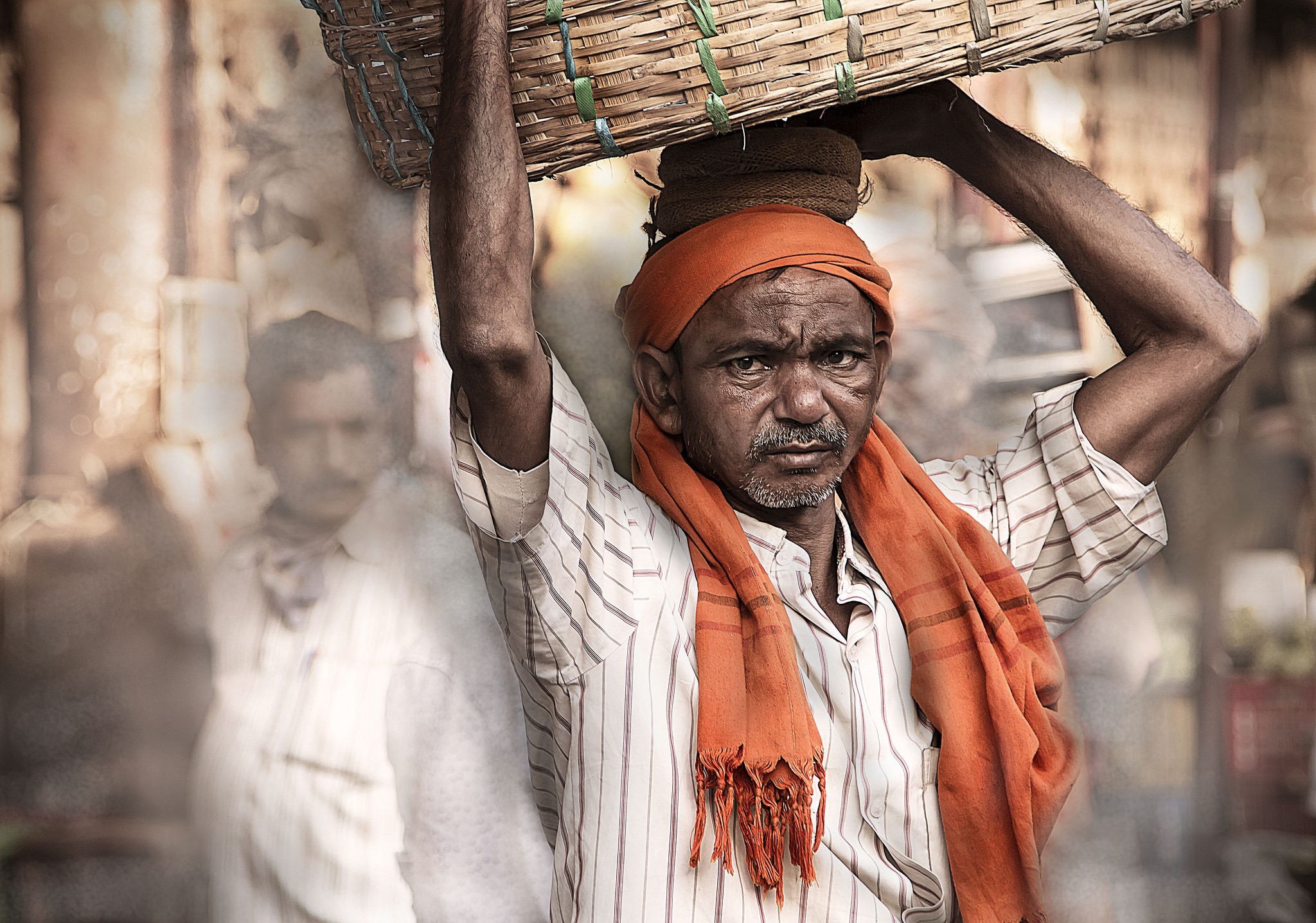 Man carrying basket on head HD Wallpaper