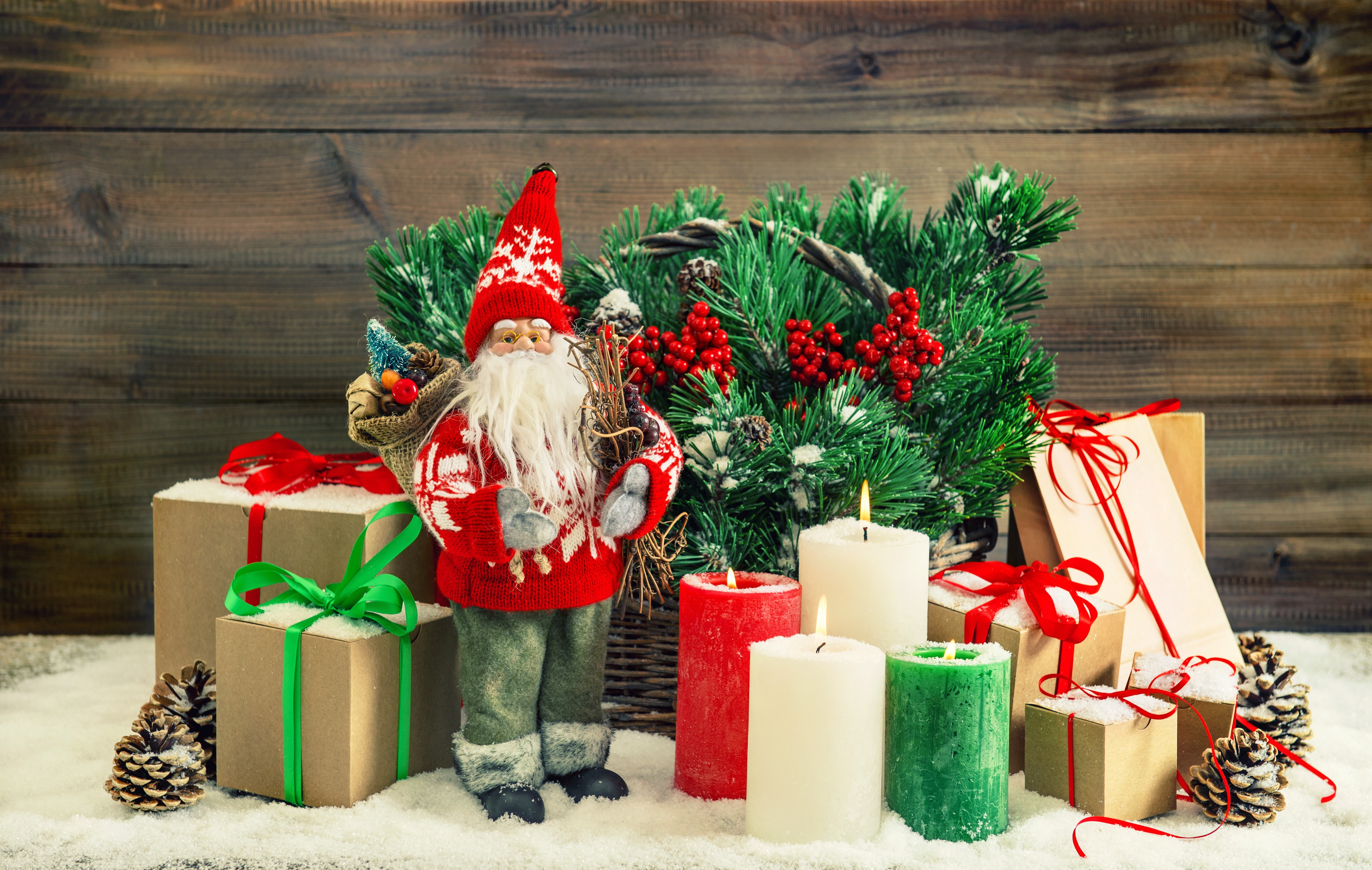 Christmas Decoration with Santa Claus, Gifts, and Candles HD Wallpaper