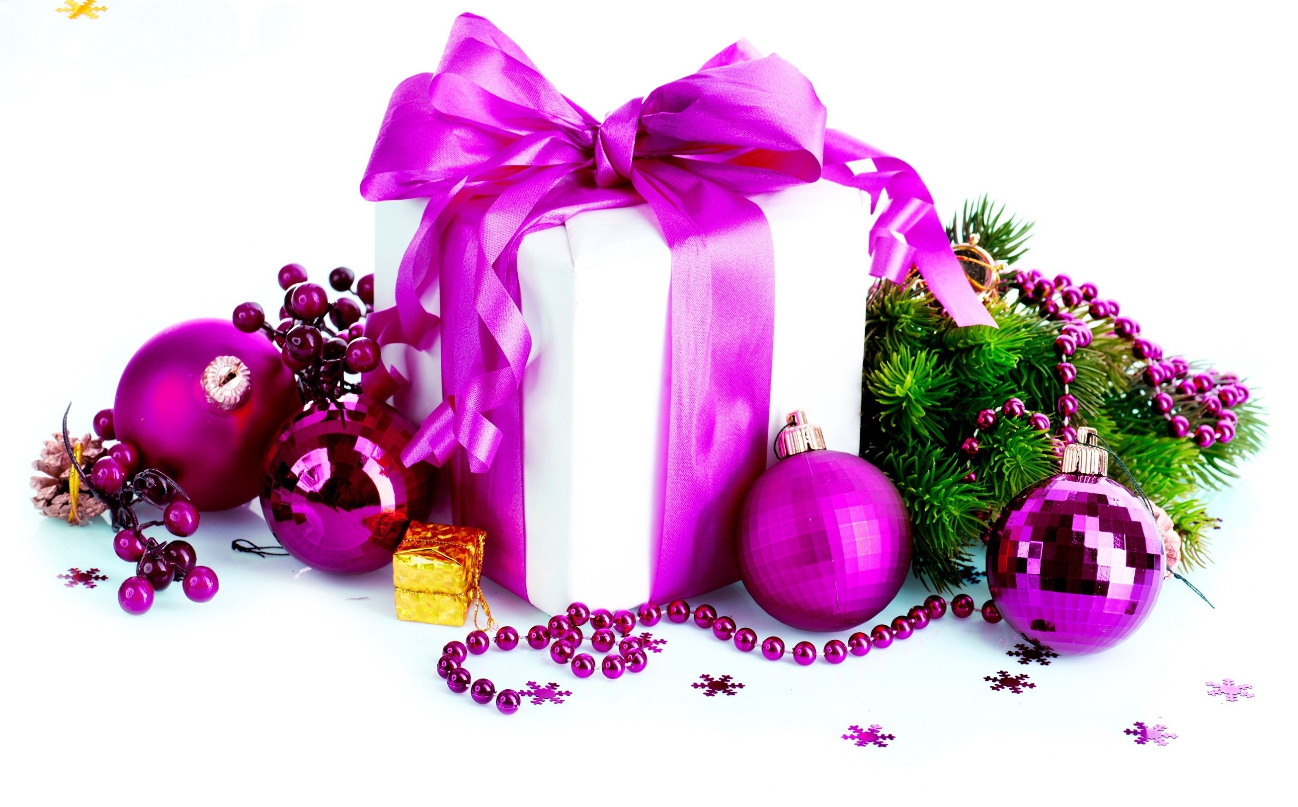 Christmas gift with purple ornaments and pine branches HD Wallpaper