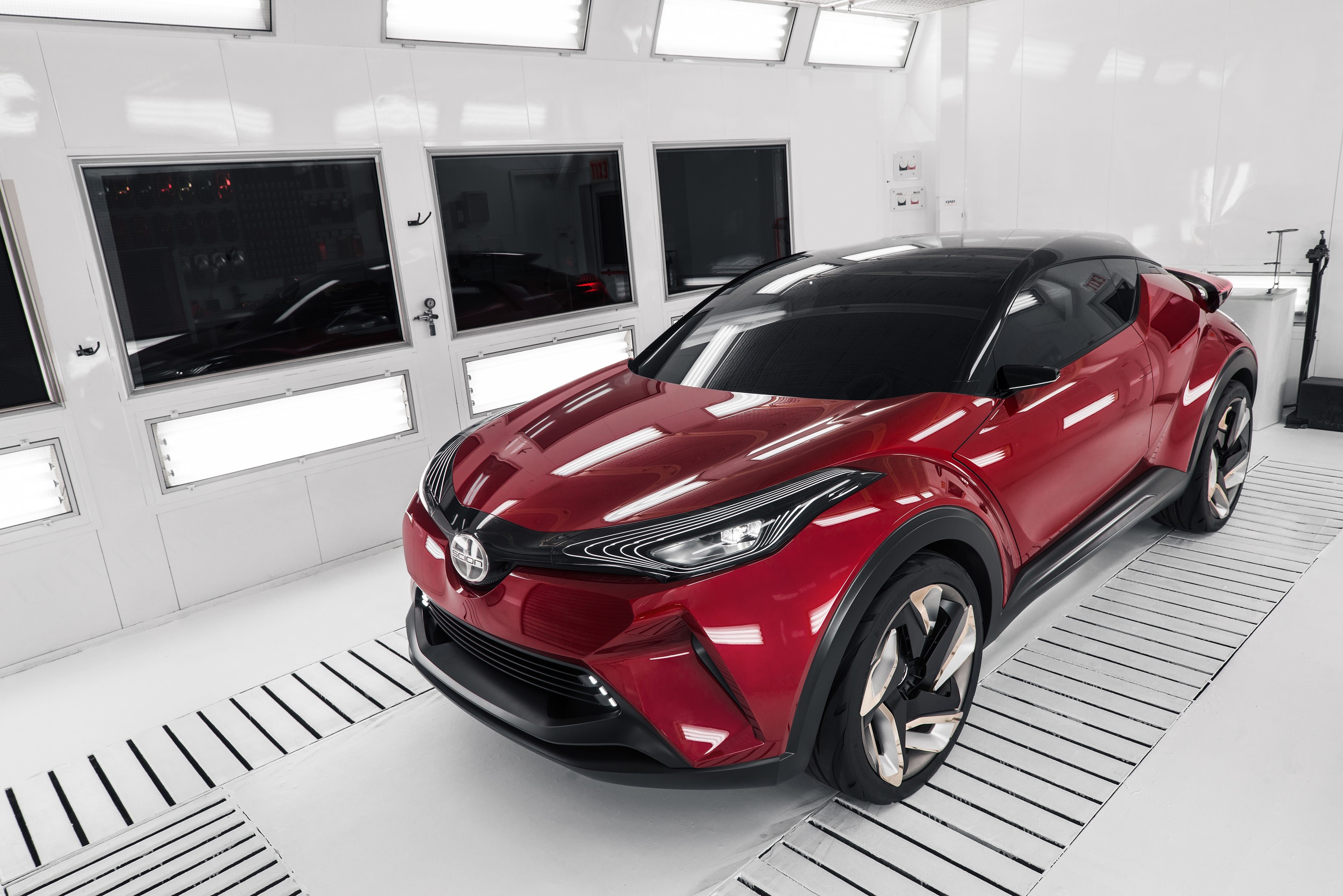 Red Toyota C-HR Concept car in a white studio HD Wallpaper