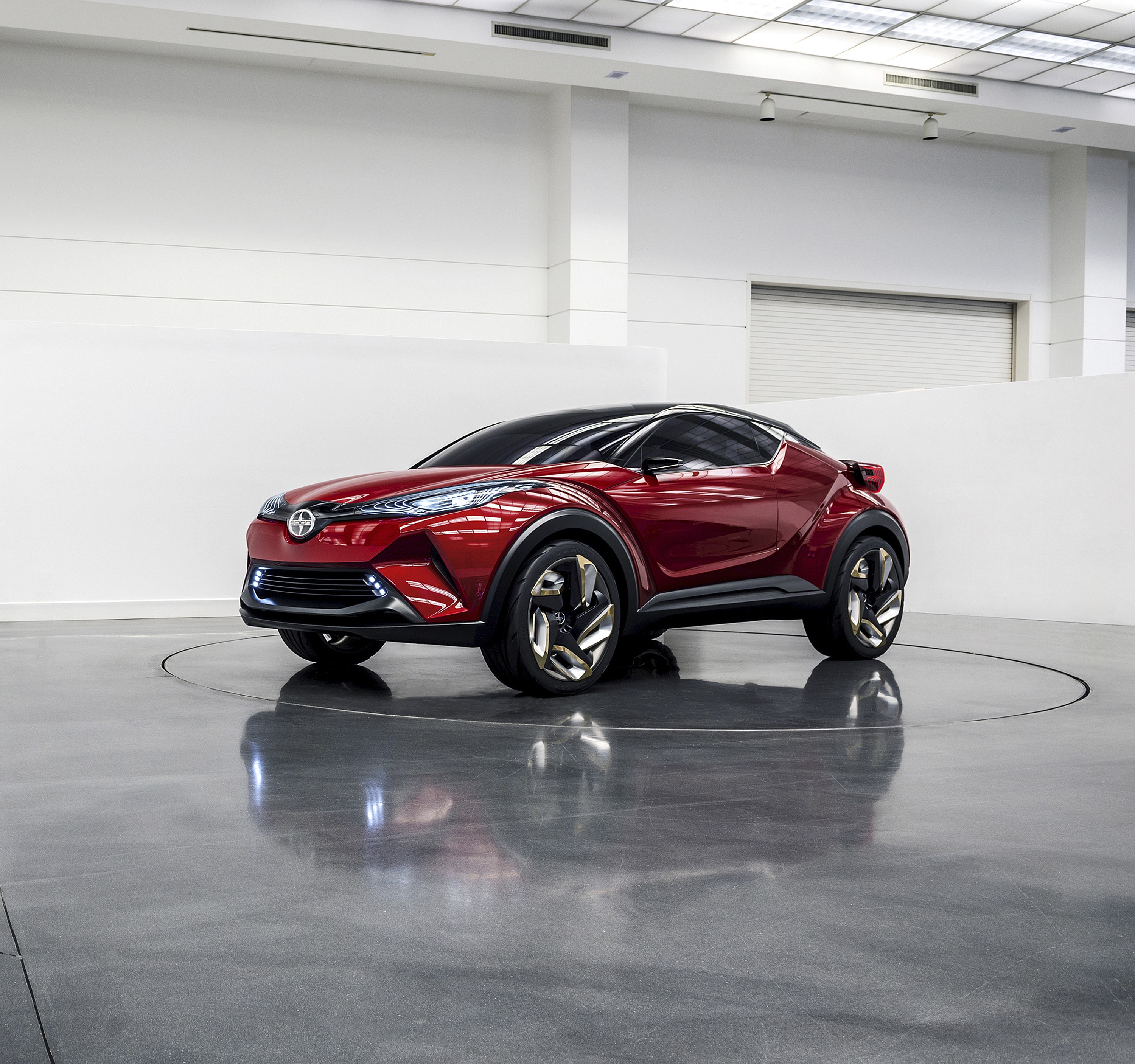 Red Toyota C-HR Concept car on a turntable HD Wallpaper