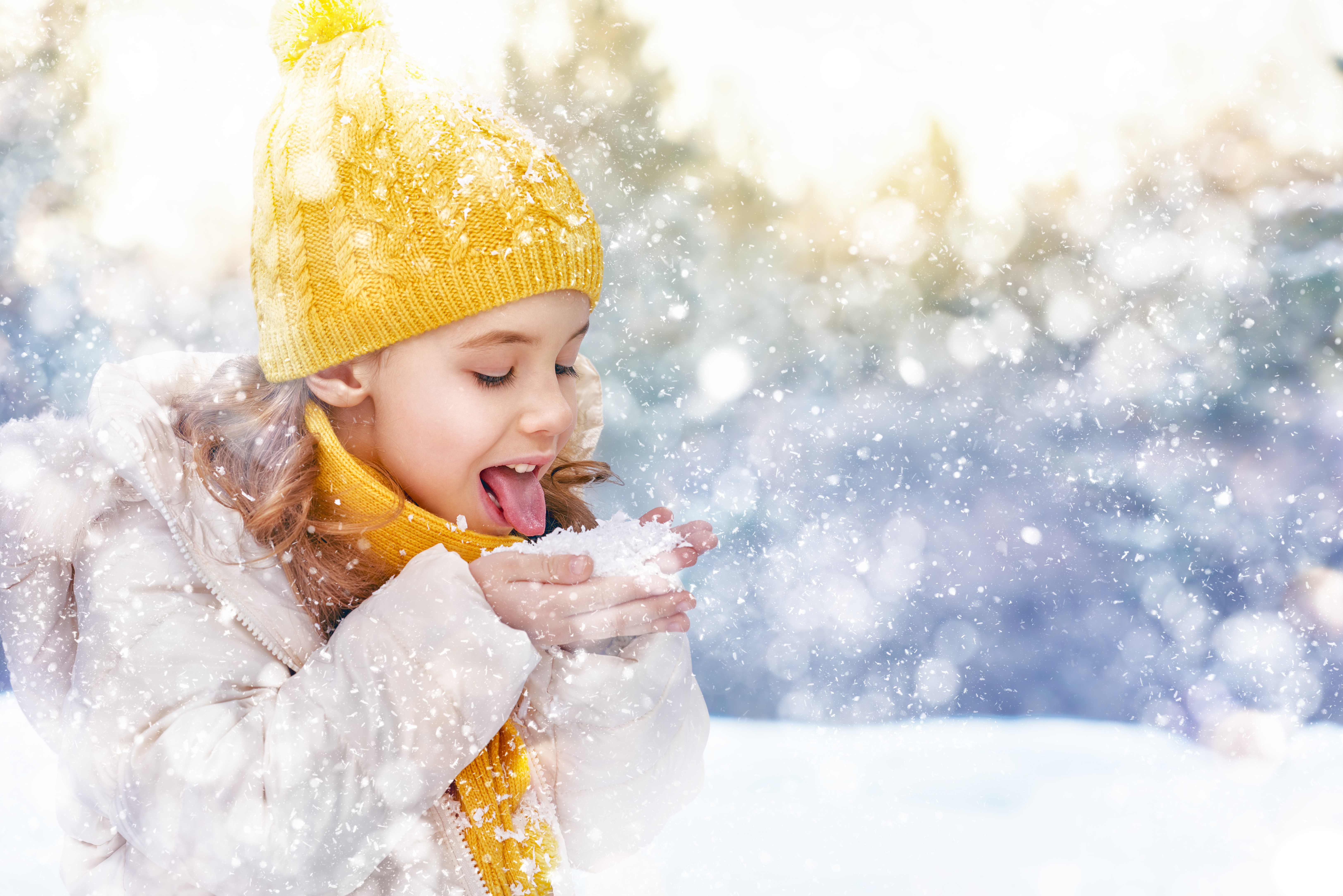 Girl in Winter Hat Eating Snow HD Wallpaper