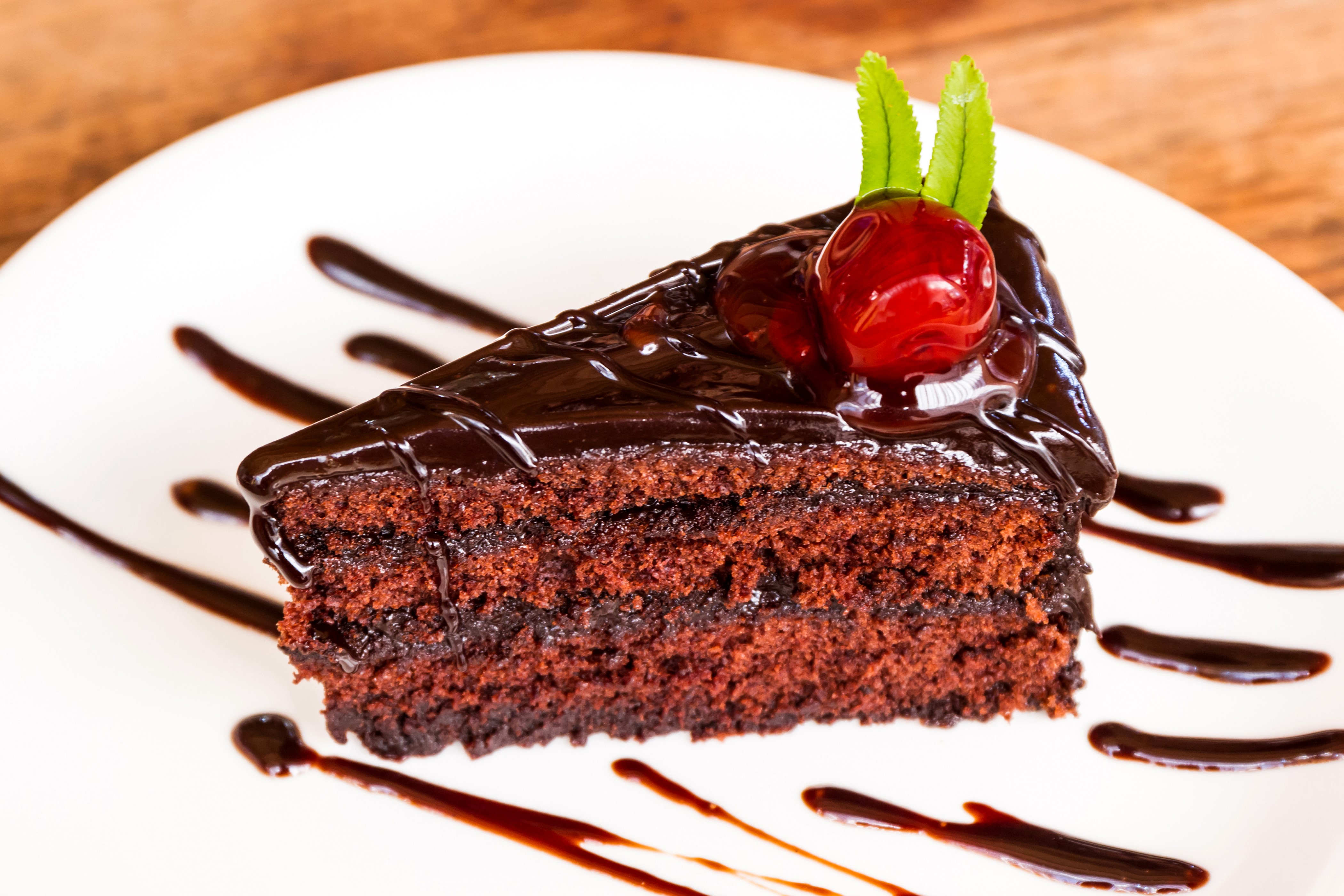 Chocolate cake slice with cherry and mint HD Wallpaper