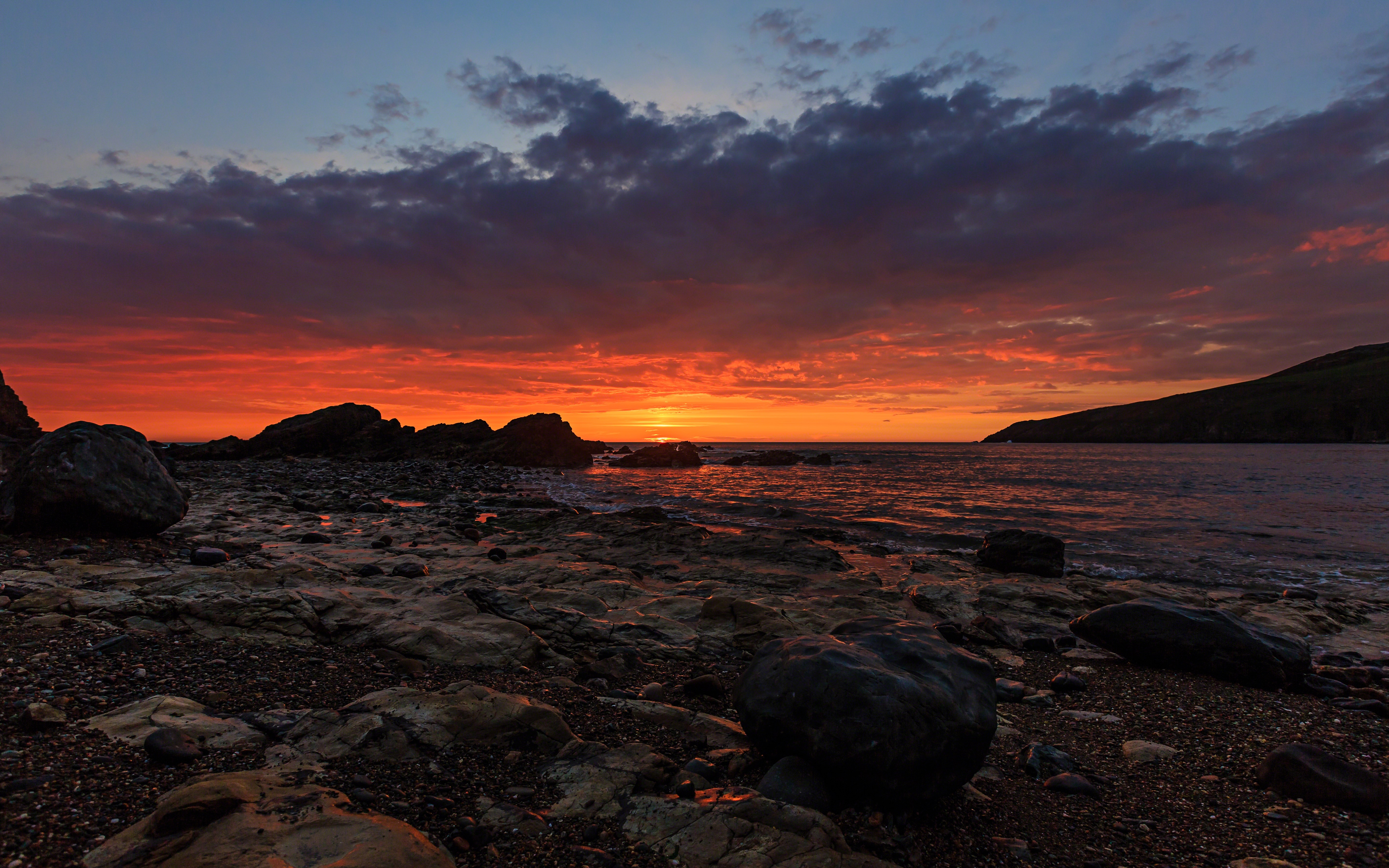 Sunset over rocky coast at Porth Swtan-Church Bay Anglesey HD Wallpaper