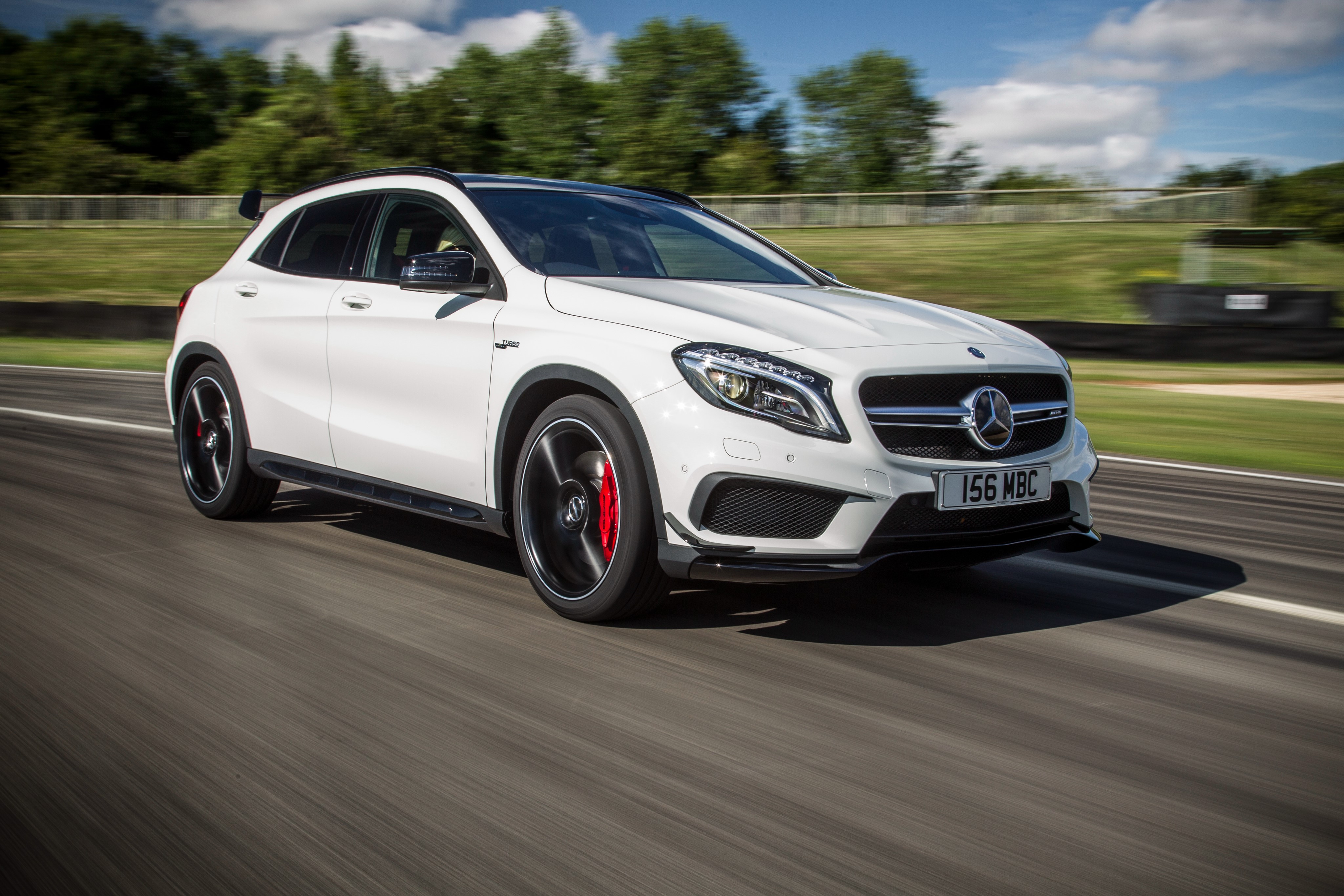 White 2014 Mercedes-Benz GLA 45 AMG on a Track HD Wallpaper
