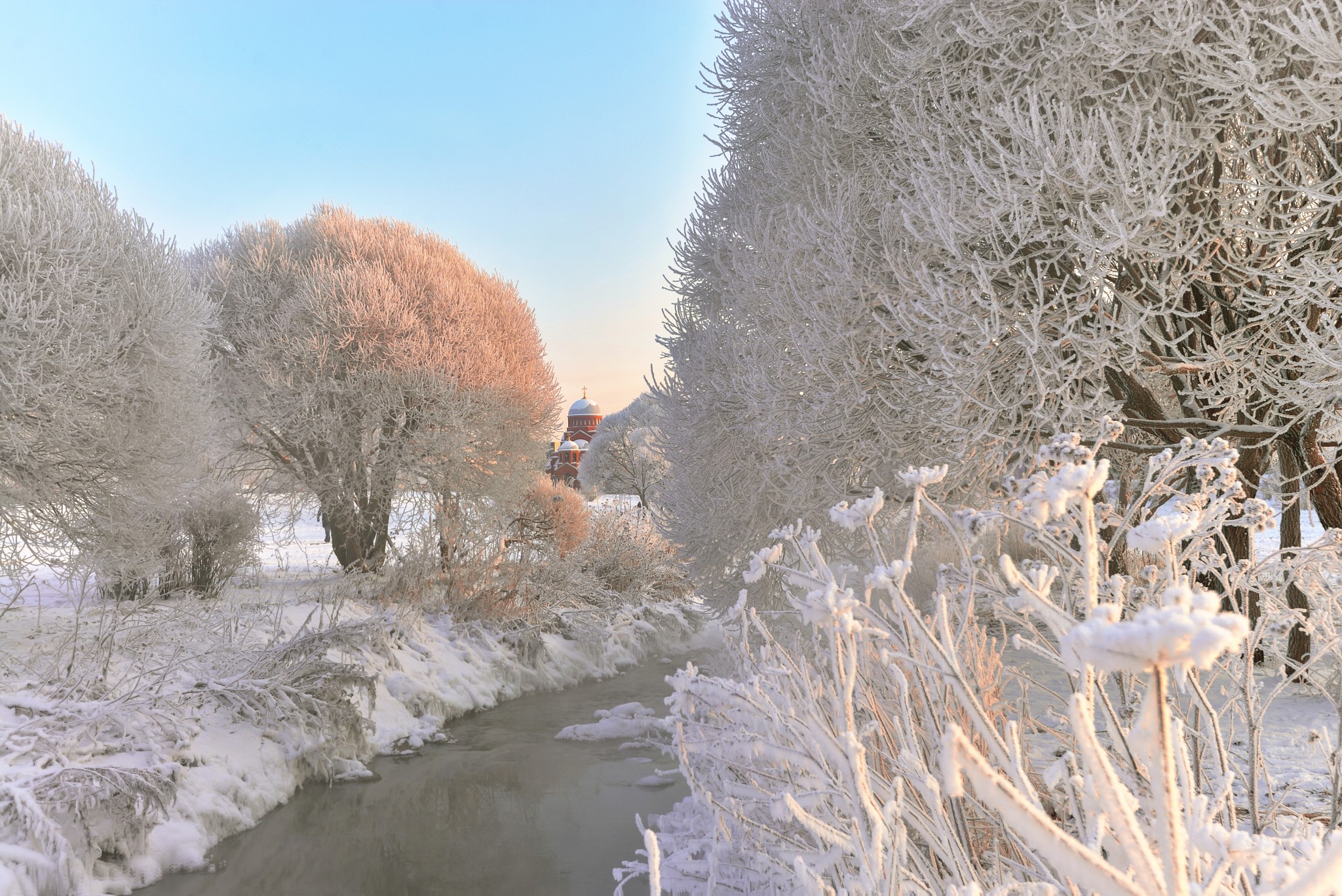 Winter scene with frosted trees and a river in Russia HD Wallpaper