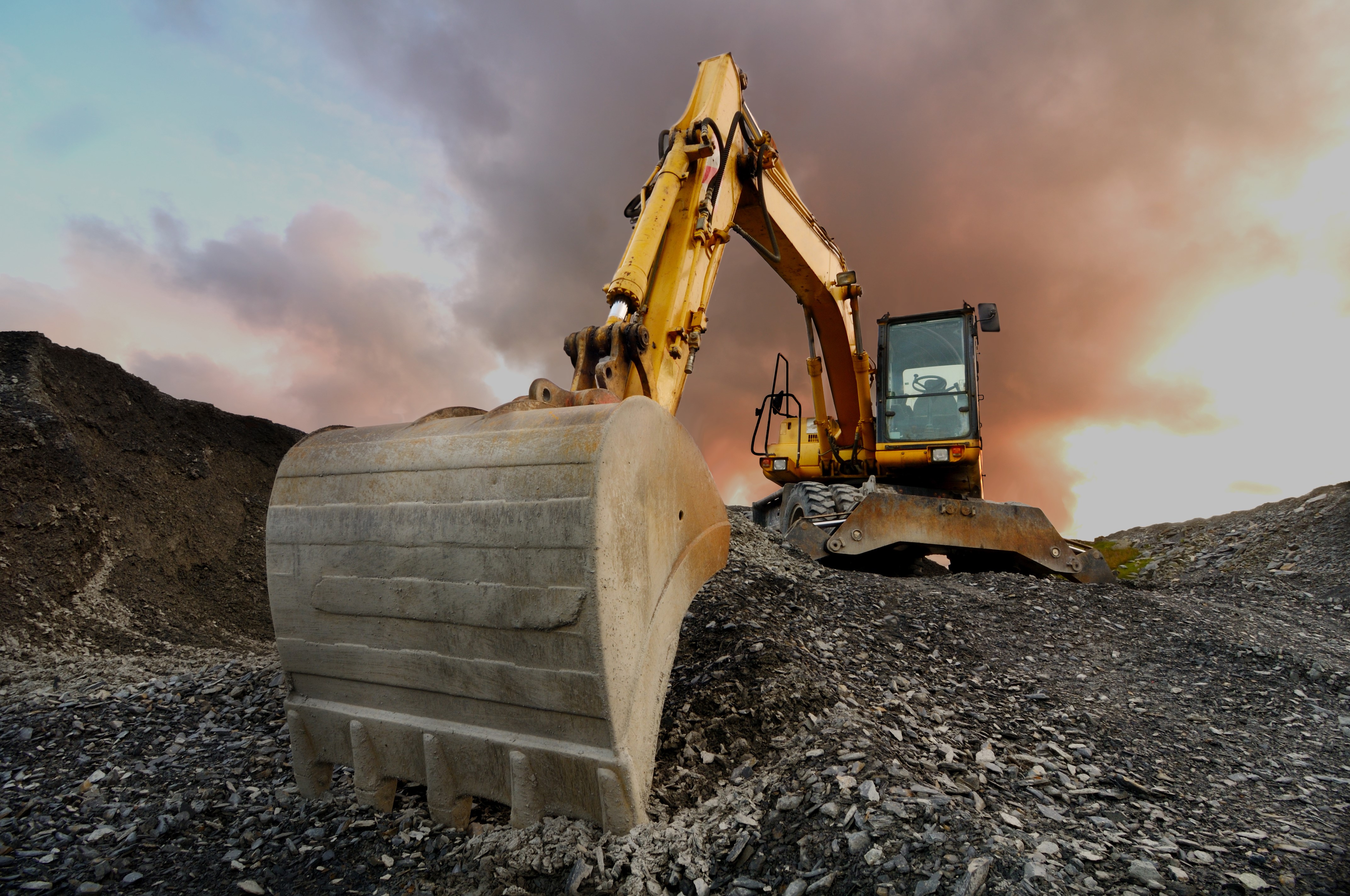 Excavator shovel seen almost face, Stones HD Wallpaper