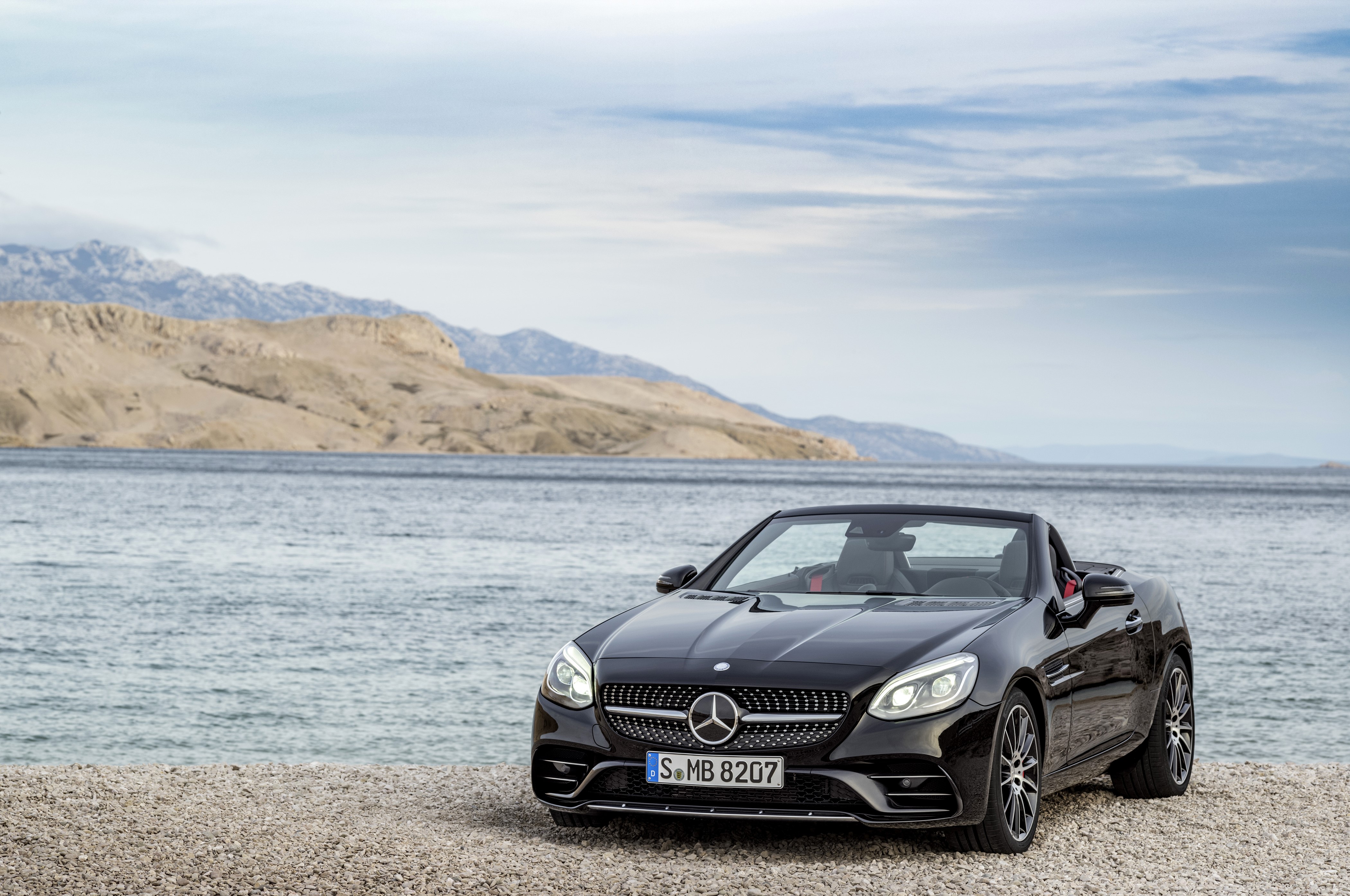 Black 2016 Mercedes-Benz AMG SLC 43 Cabriolet on Coast HD Wallpaper