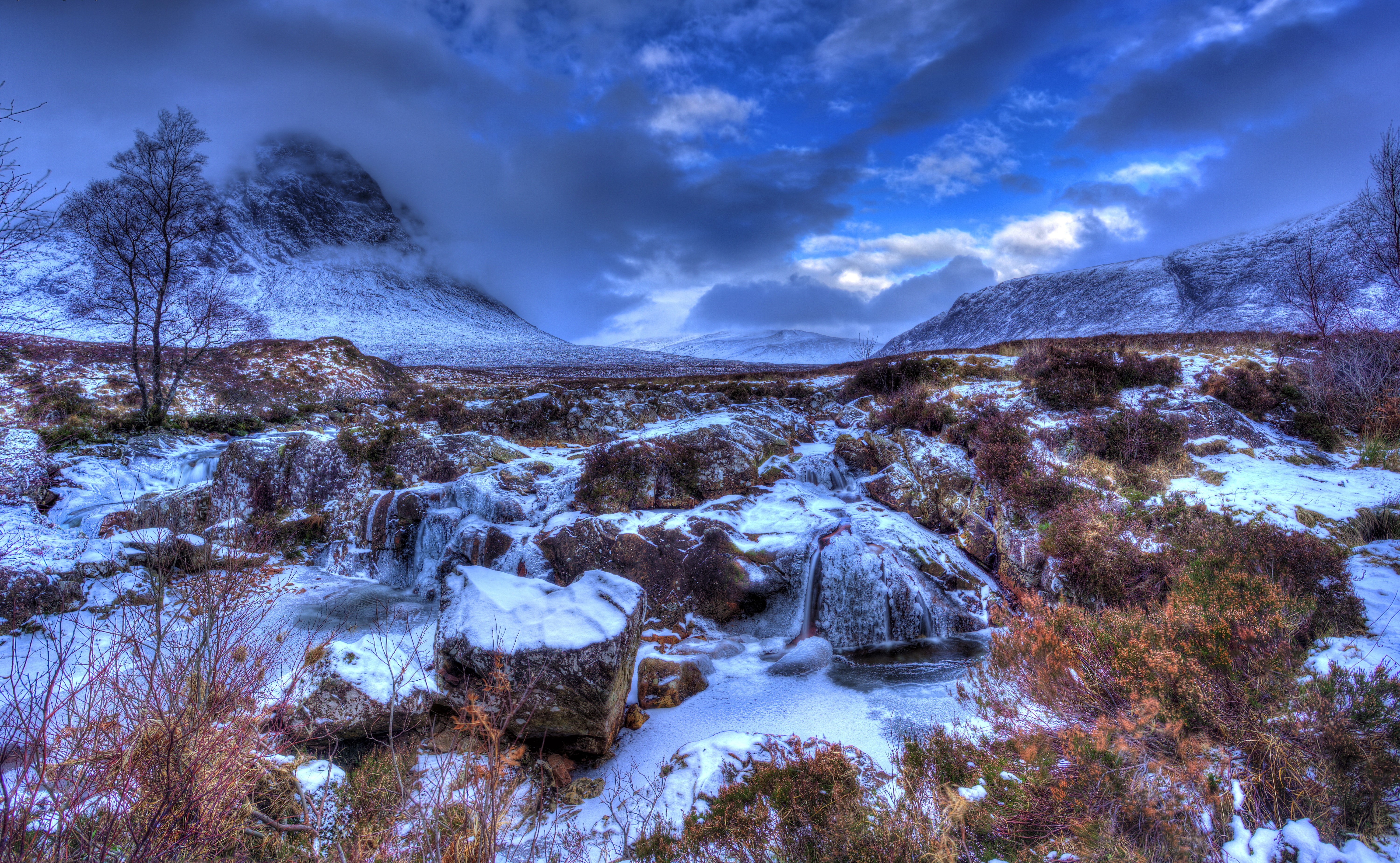Winter mountain scenery with snow and frozen stream HD Wallpaper