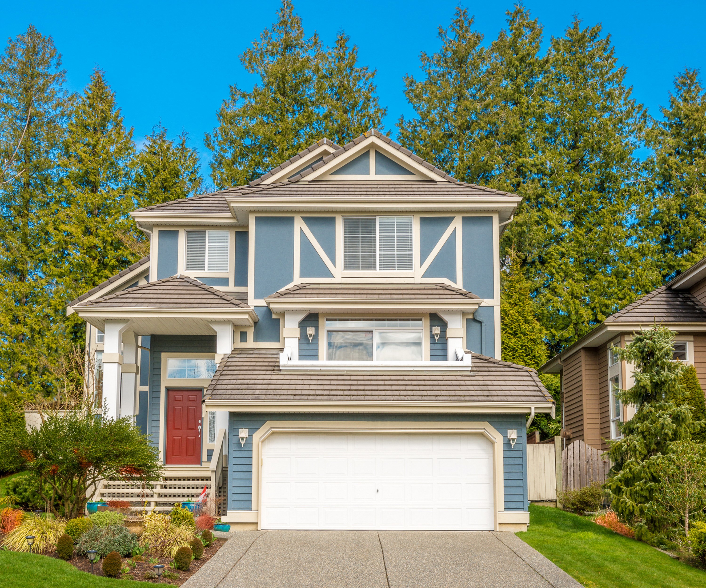 Blue Two-Story House with Red Door and Garage HD Wallpaper