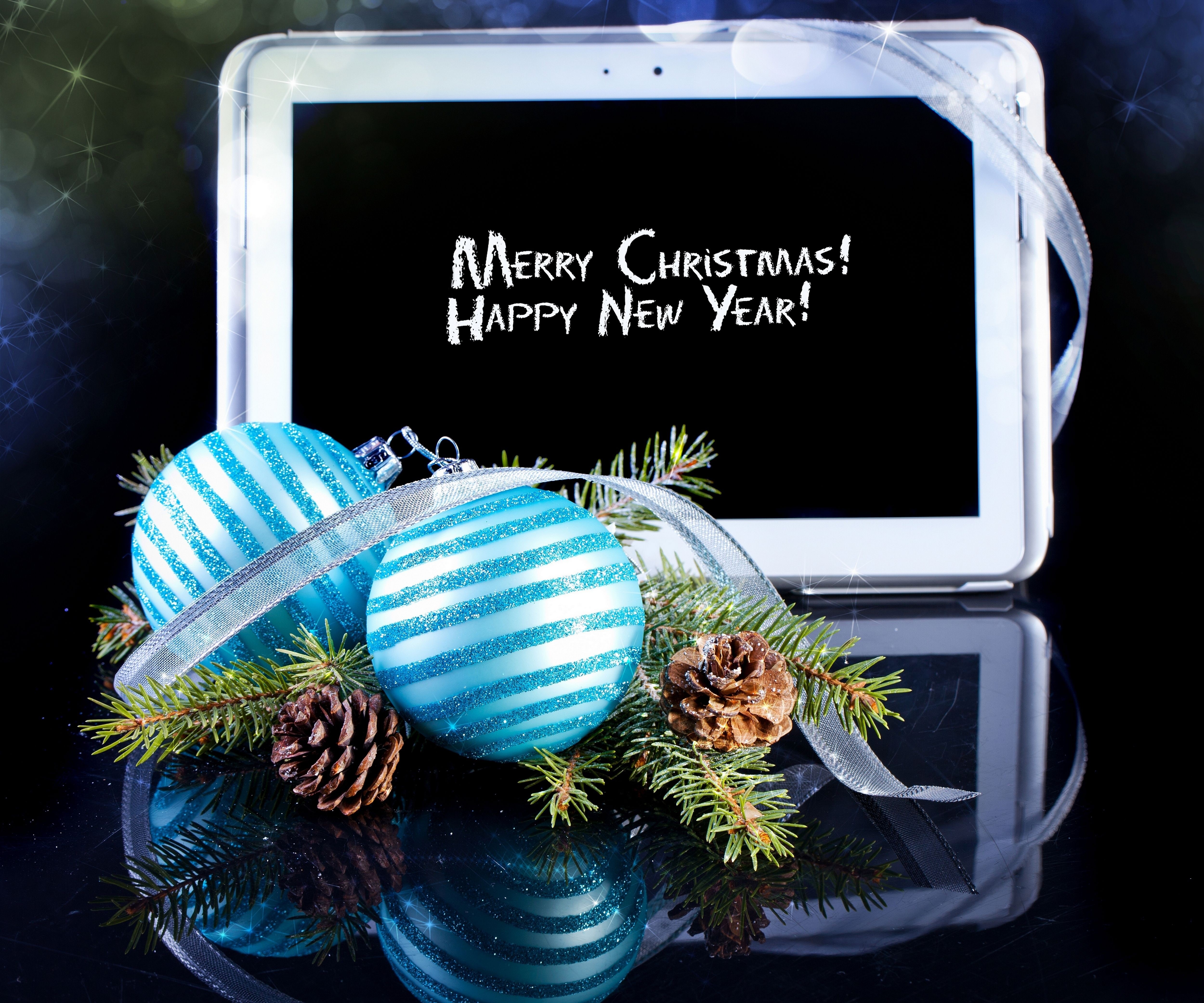 Christmas tablet with ornaments and pine cones HD Wallpaper