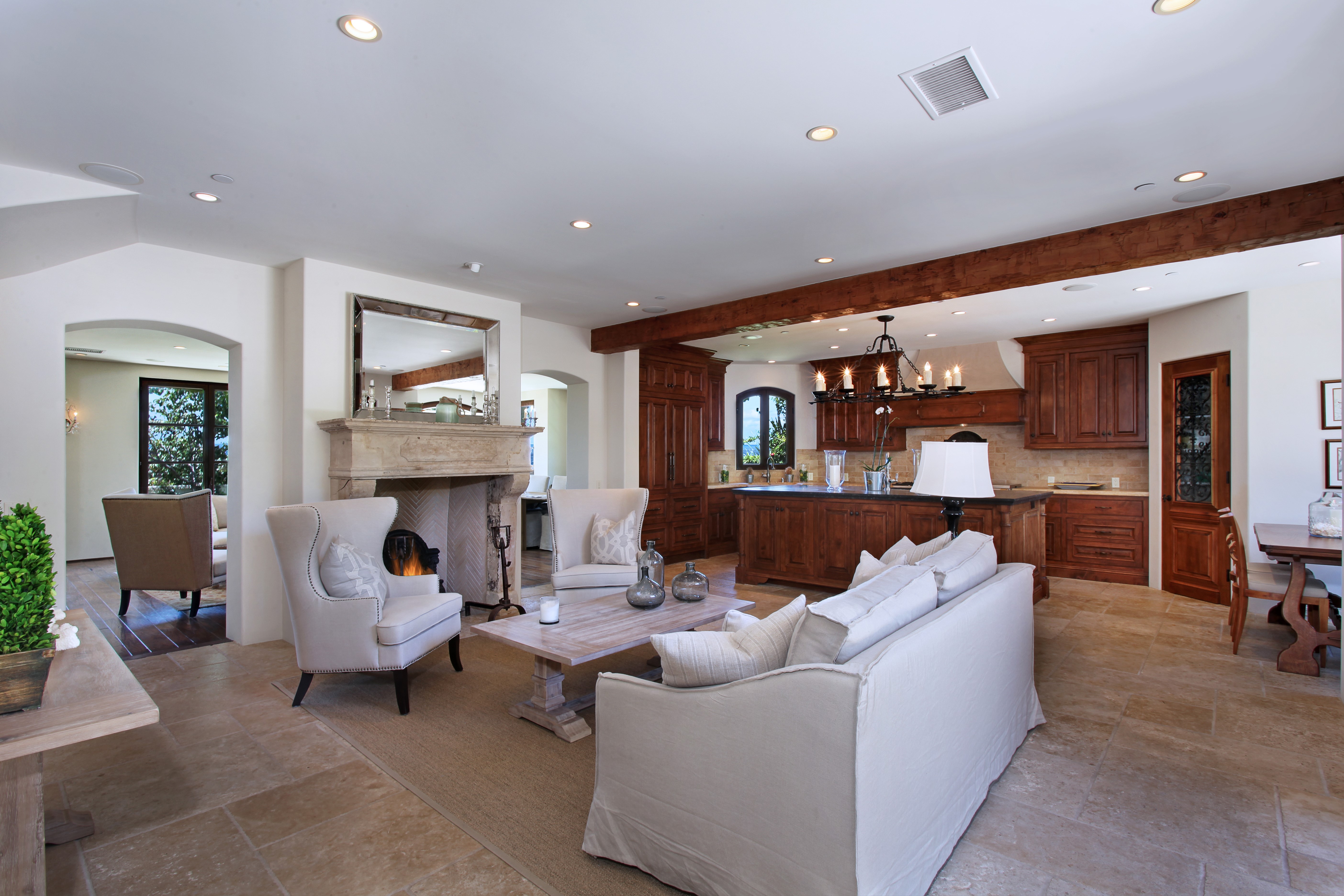 Living room with fireplace and kitchen HD Wallpaper