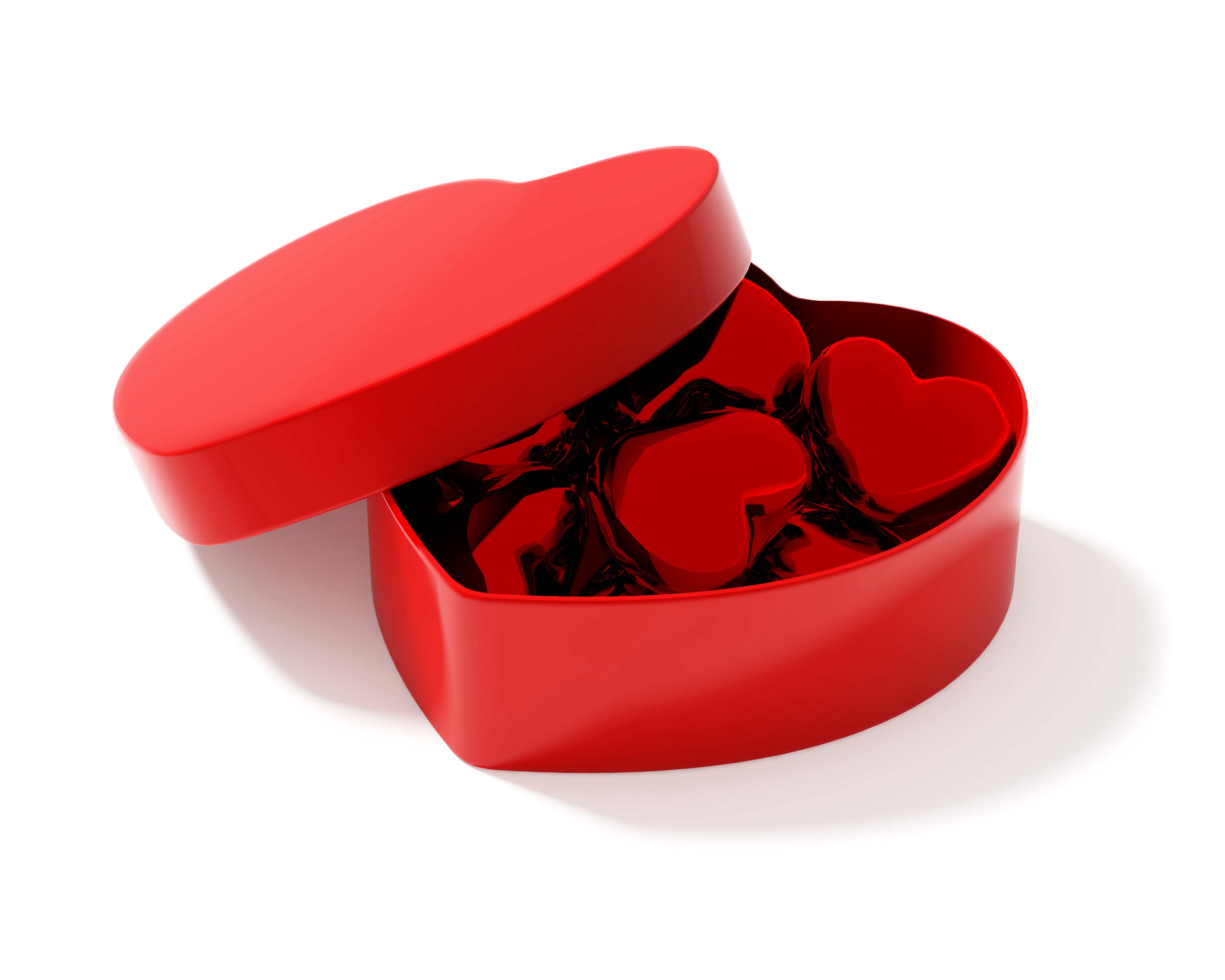 Red heart-shaped box of chocolates HD Wallpaper