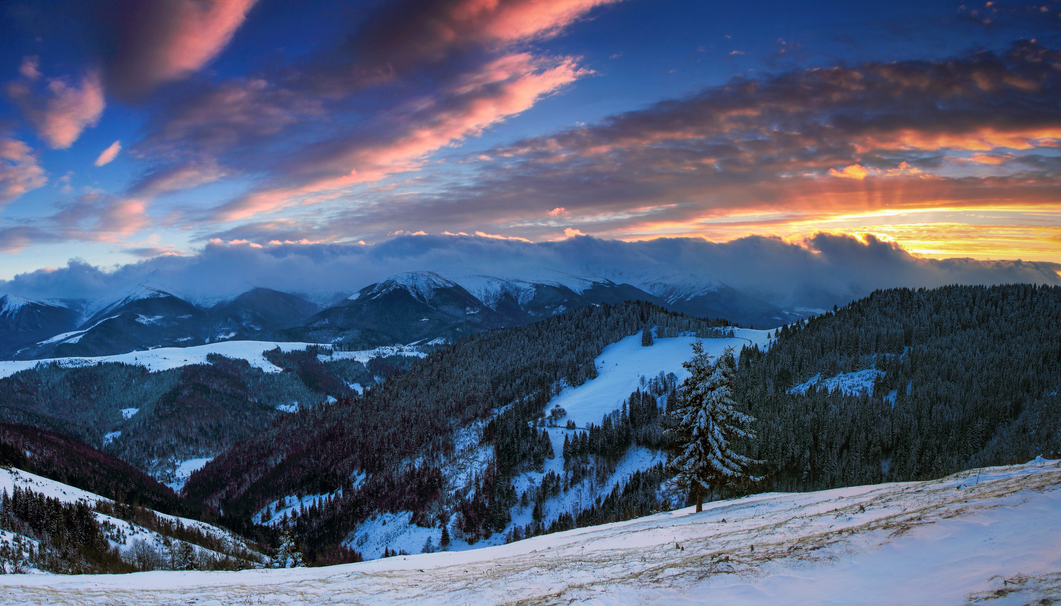 Winter mountain landscape at sunrise with colorful clouds HD Wallpaper