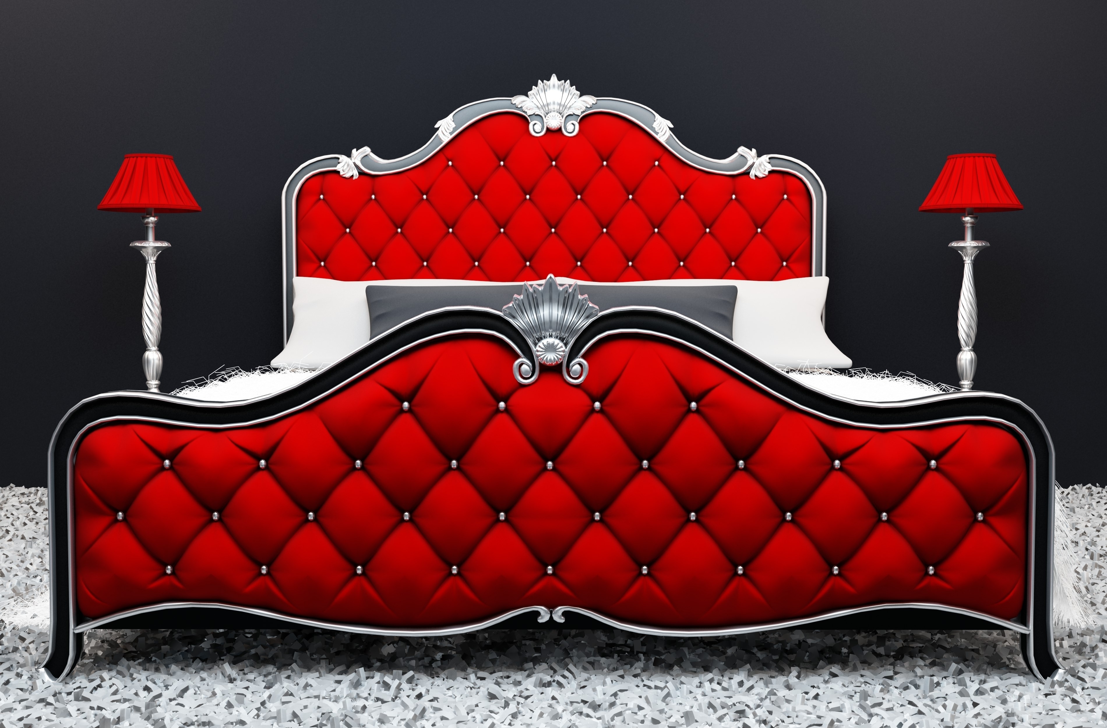 Red tufted bed with silver accents and red lamps HD Wallpaper
