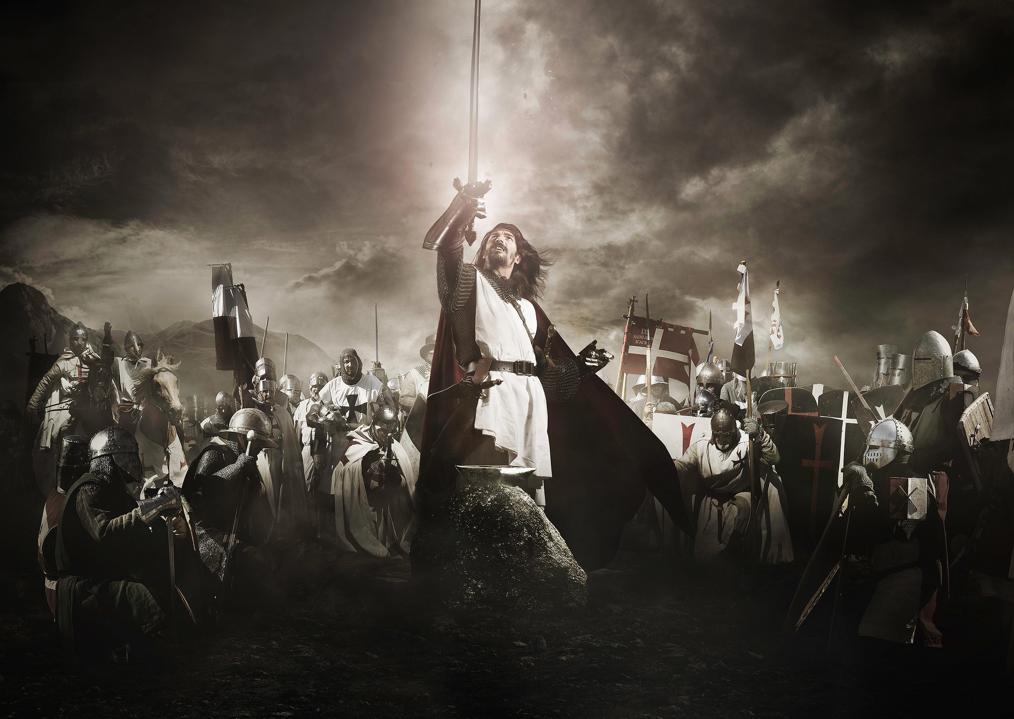 Knights raising swords in a dramatic battle scene HD Wallpaper