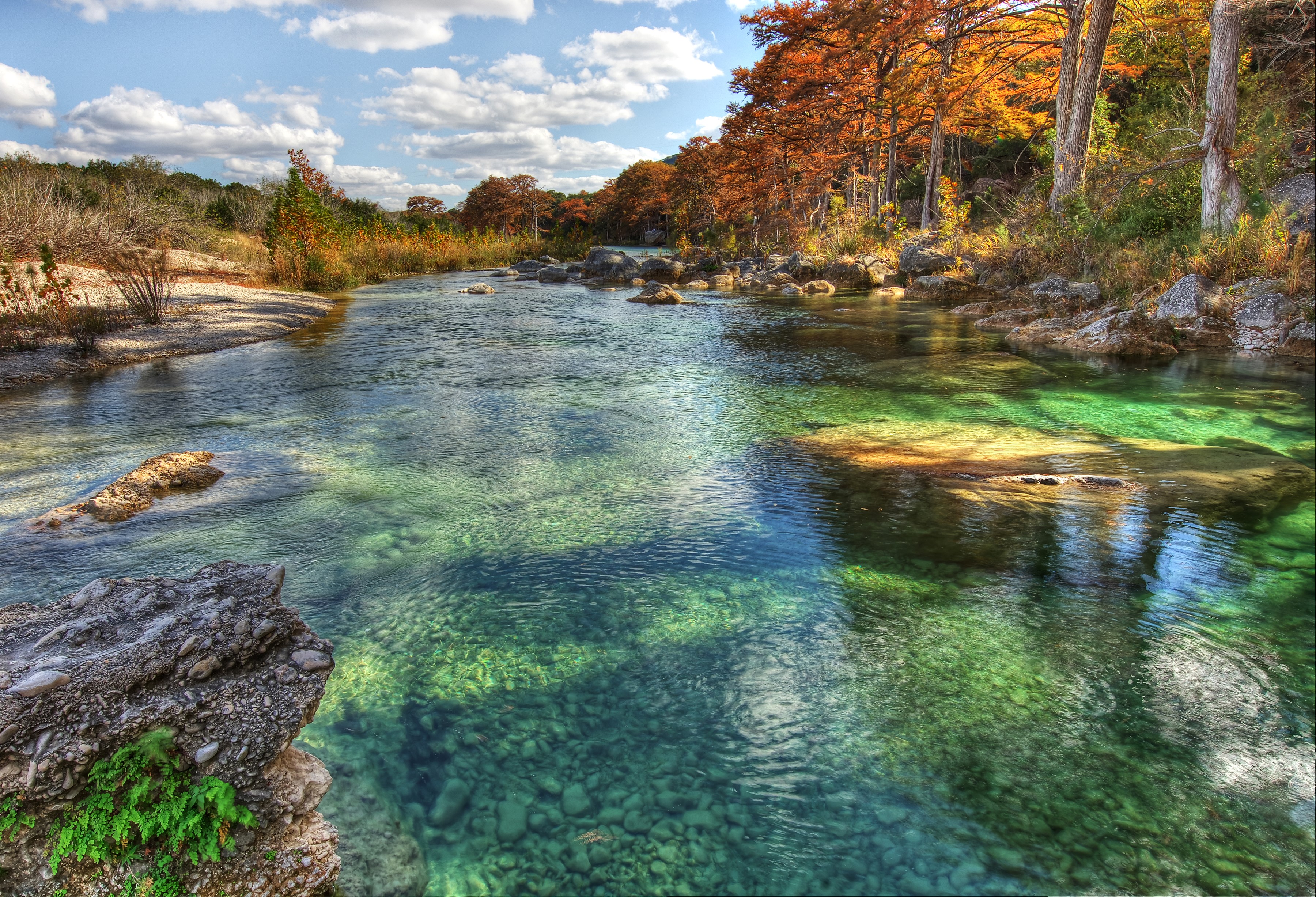 Autumn trees line the Frio River in Texas HD Wallpaper