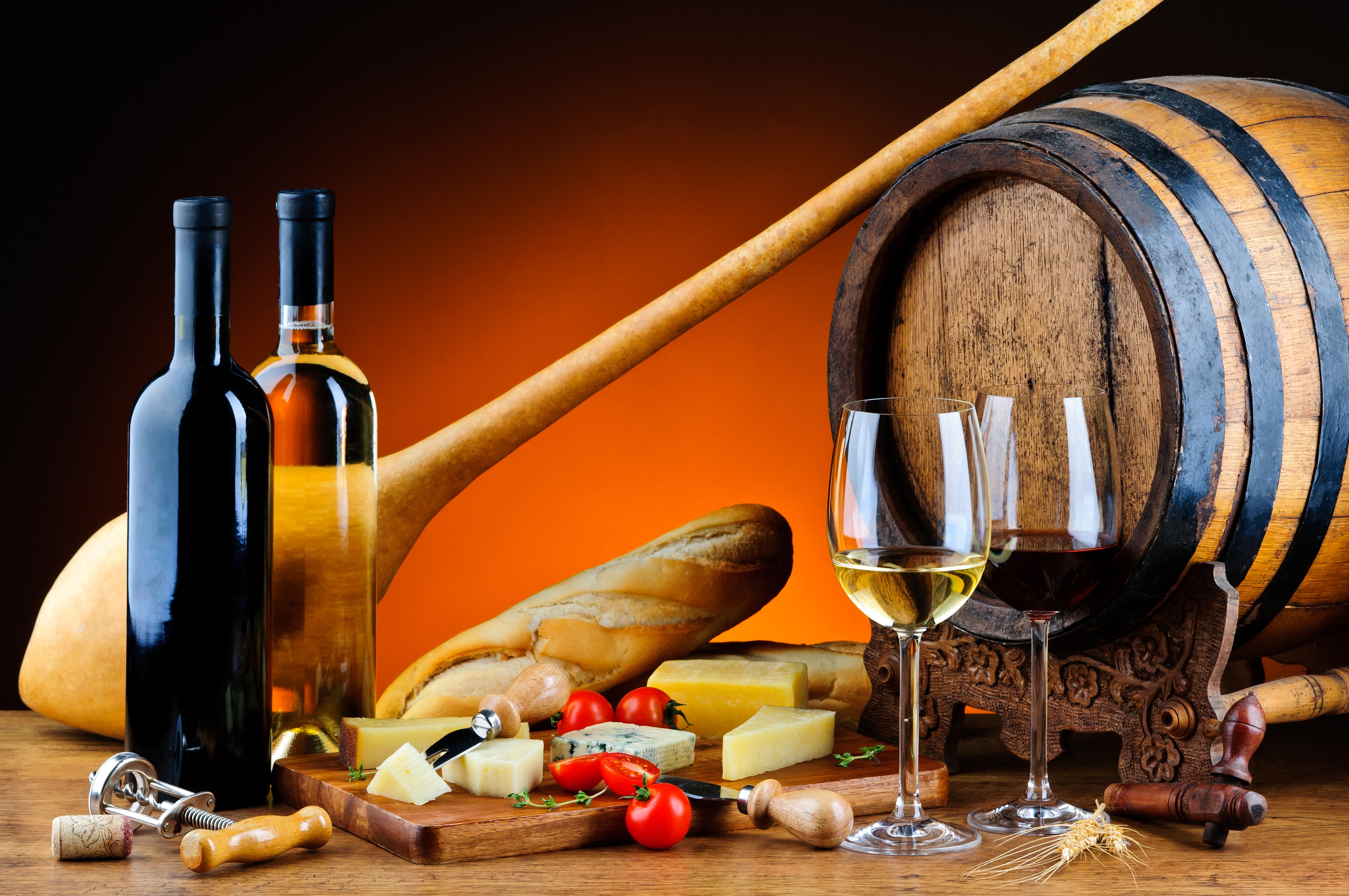 Wine bottles, glasses, cheese, bread, and barrel HD Wallpaper