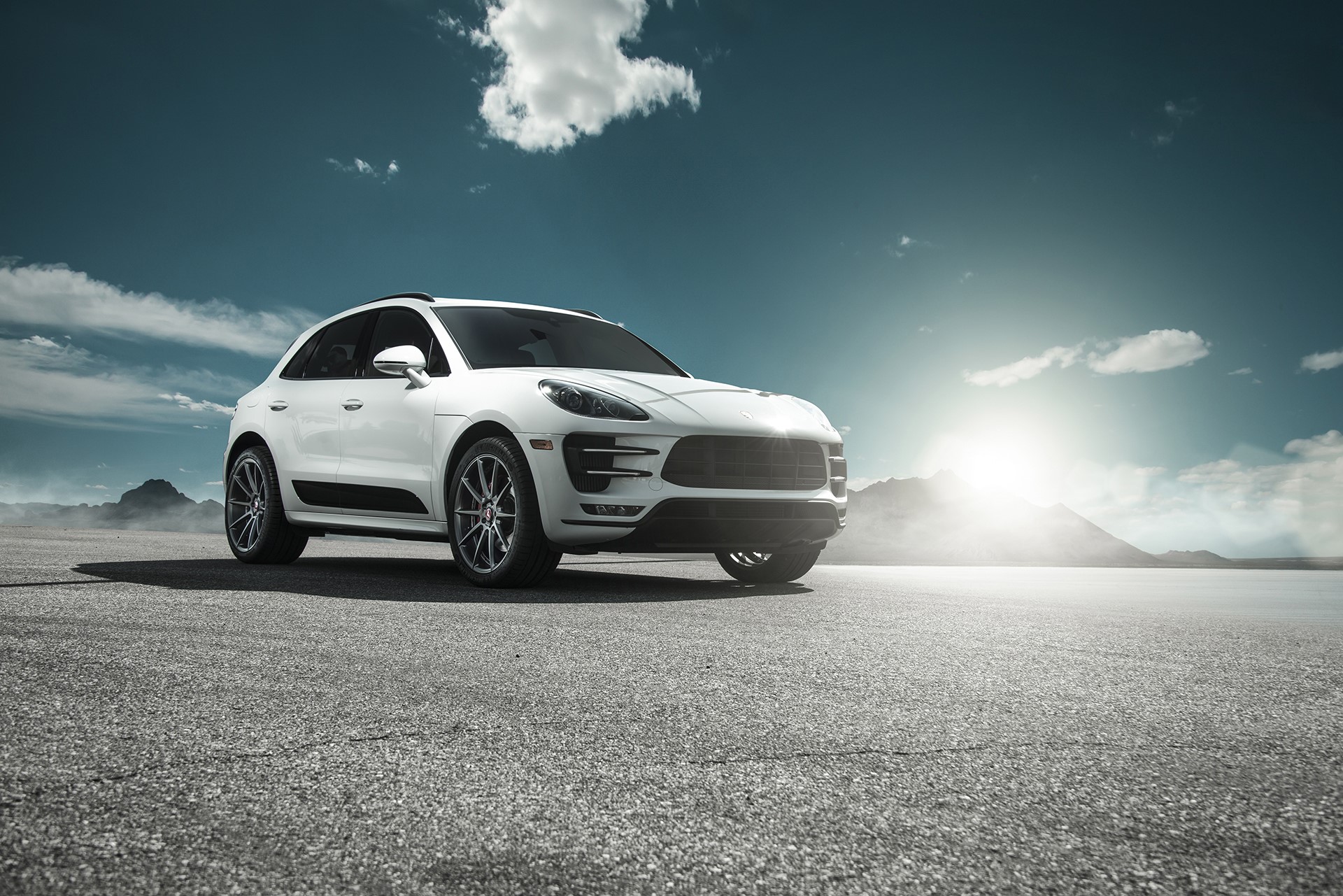 White Porsche Macan on a paved surface HD Wallpaper