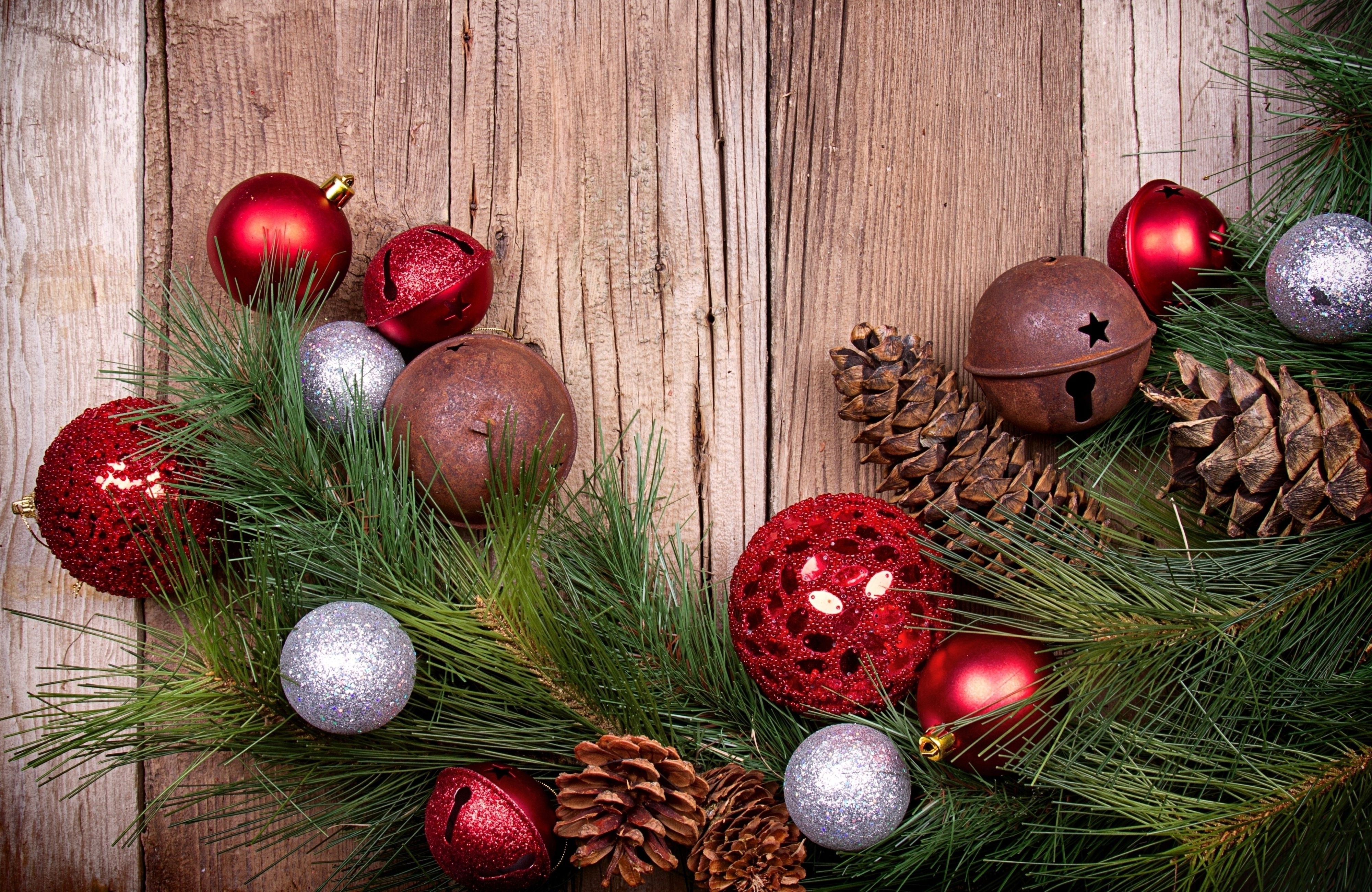 Christmas Ornaments and Pine Cones on Wood HD Wallpaper