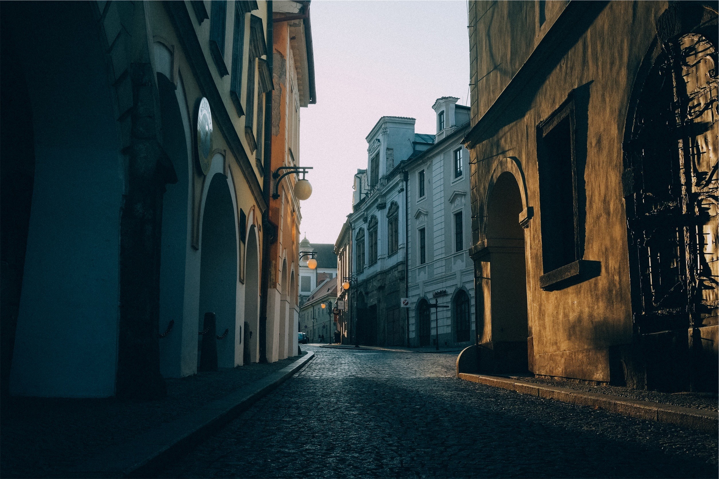 Cobblestone street with old buildings HD Wallpaper