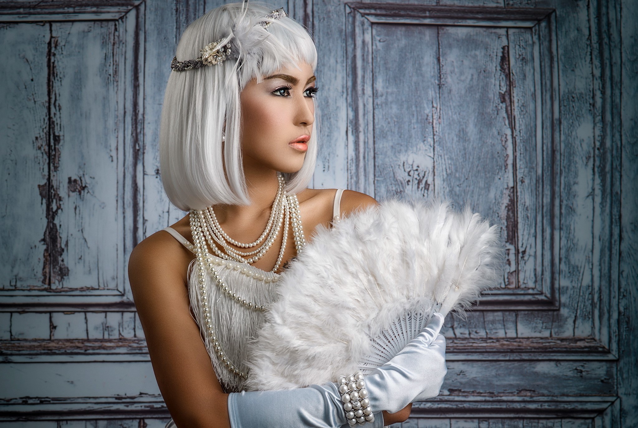 Asian woman in 1920s attire with feather fan HD Wallpaper