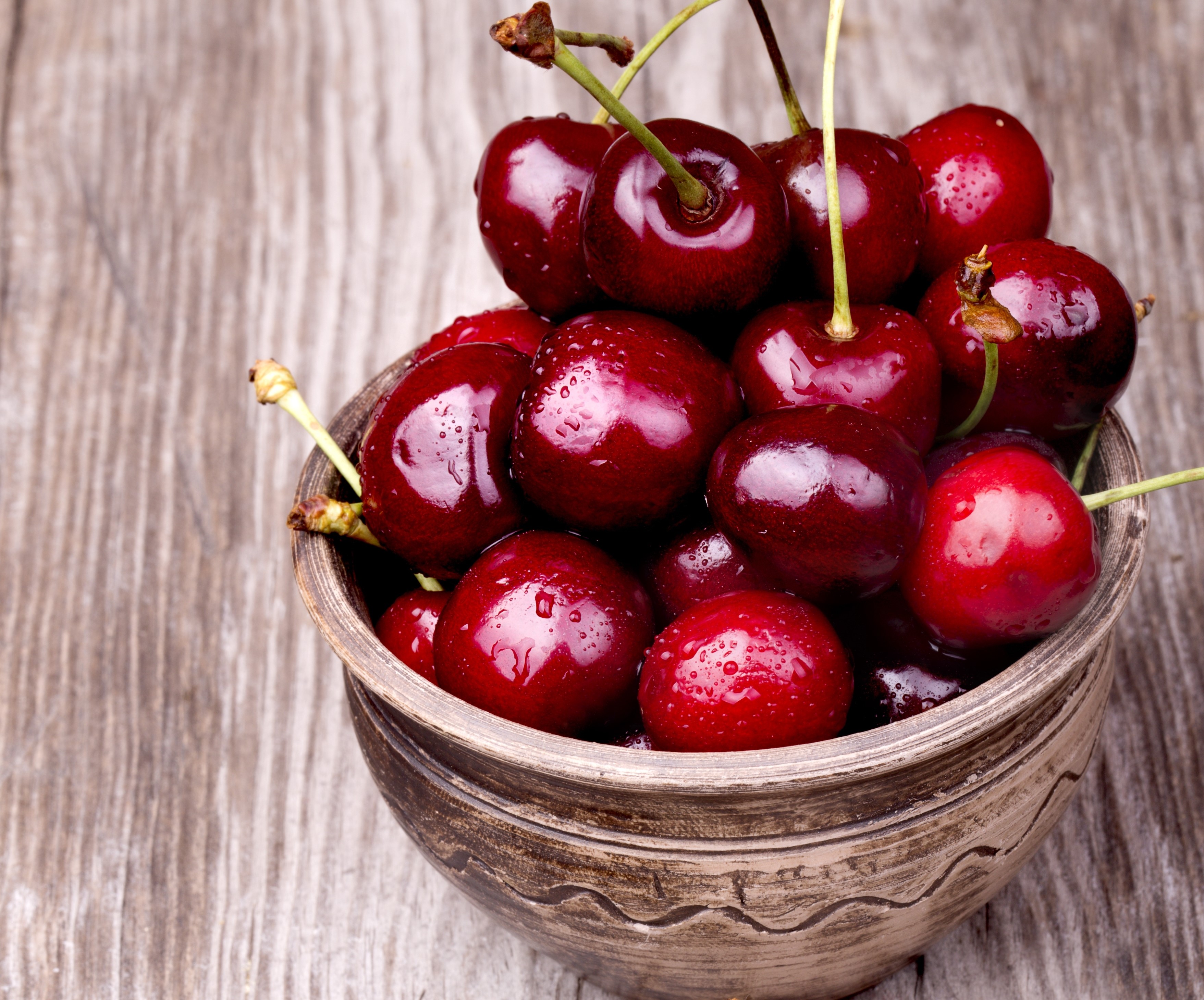 Bowl of fresh cherries with water droplets HD Wallpaper