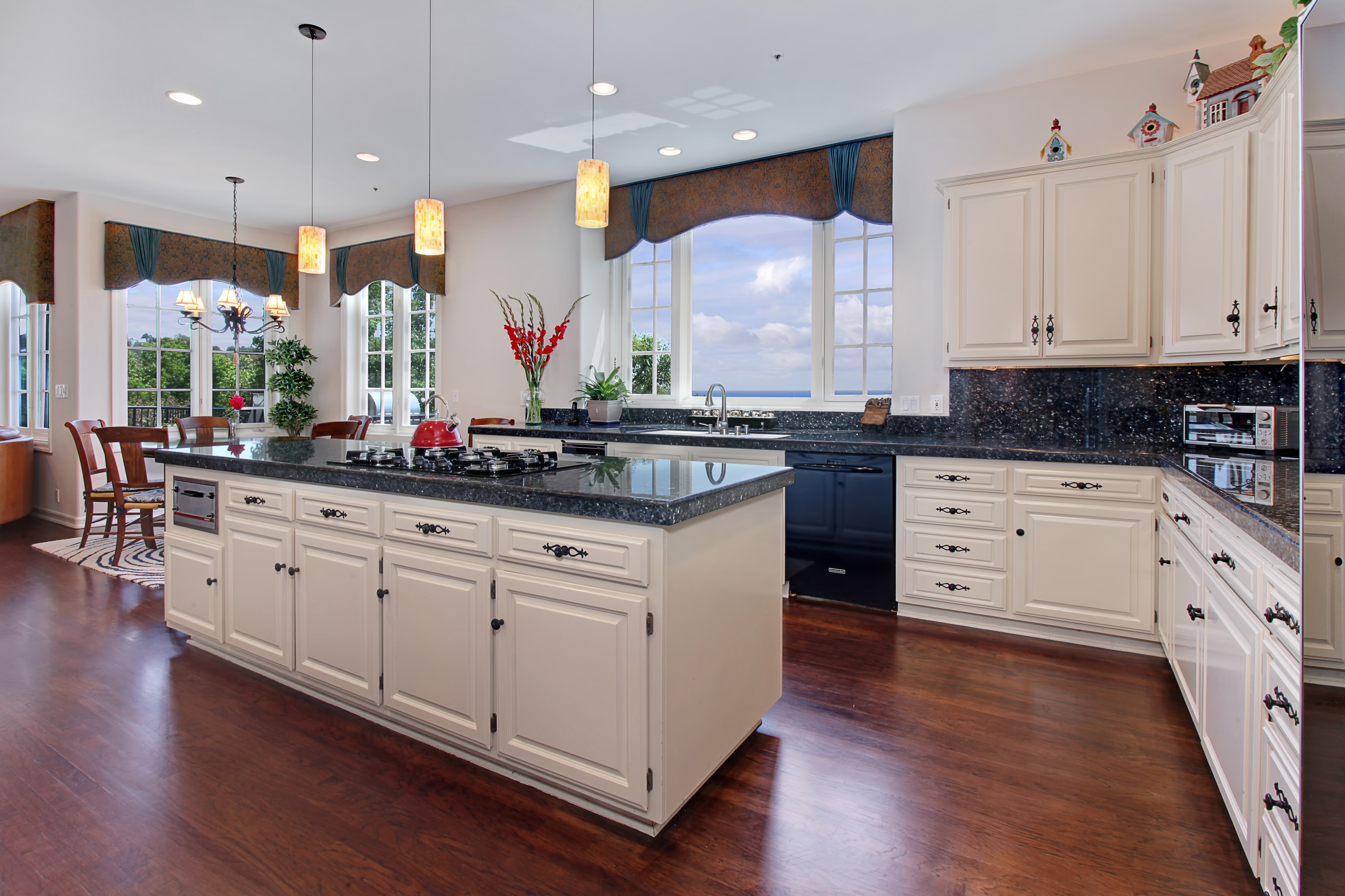Kitchen with island and dining area HD Wallpaper