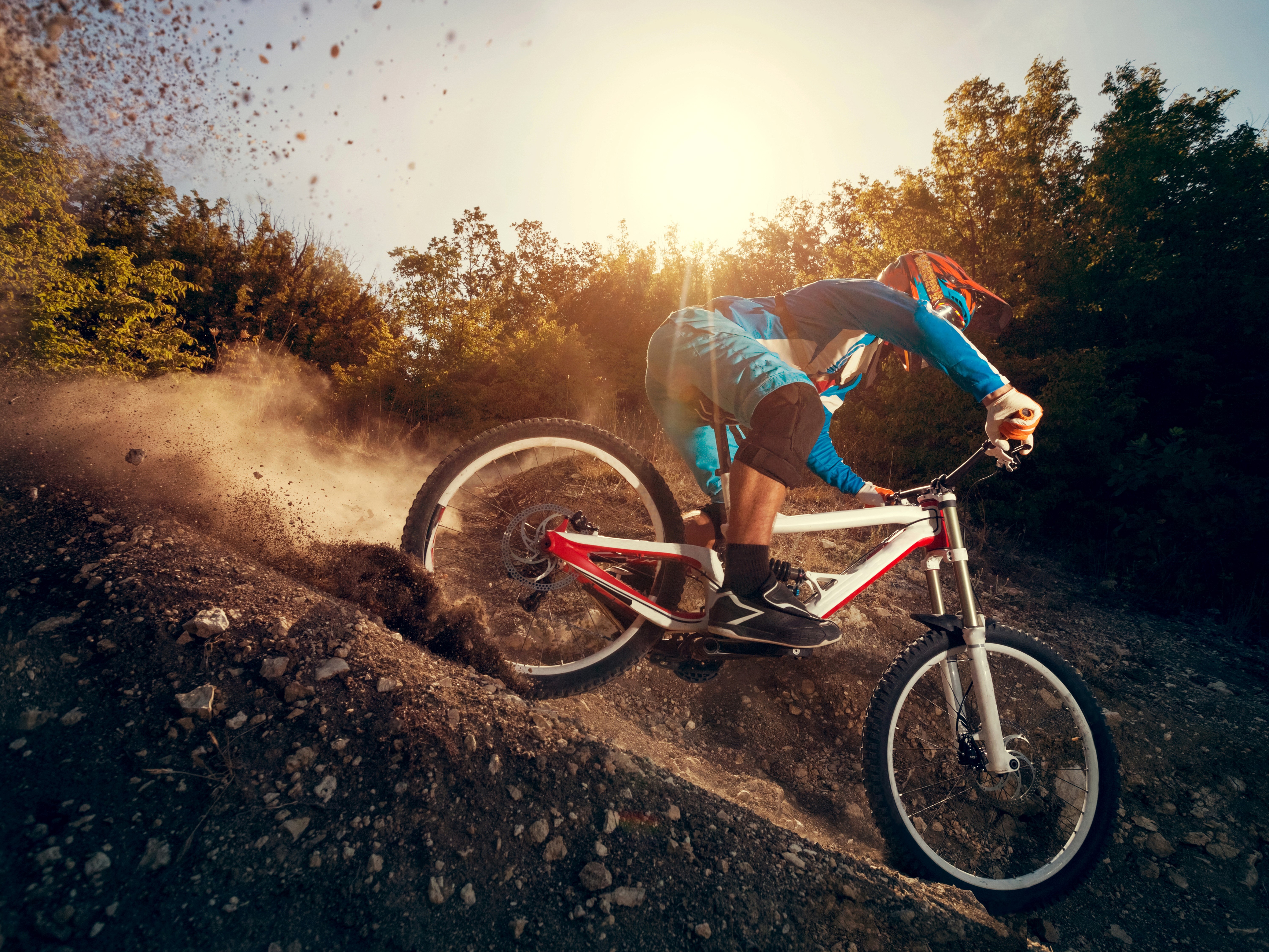 Mountain biker riding downhill HD Wallpaper